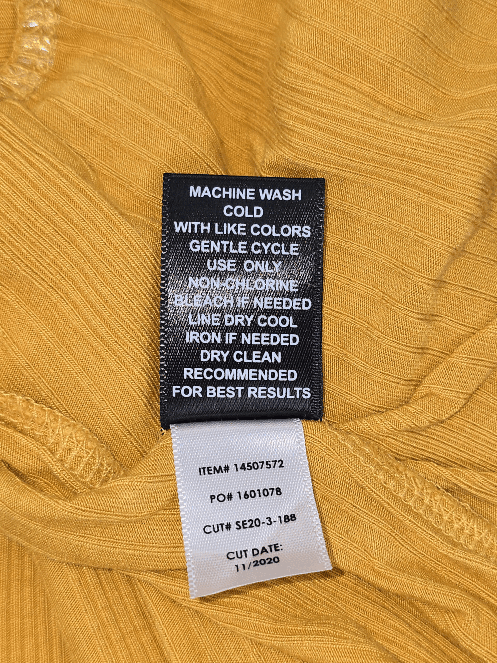 Torrid yellow ribbed scoop neck long sleeve top care instructions label