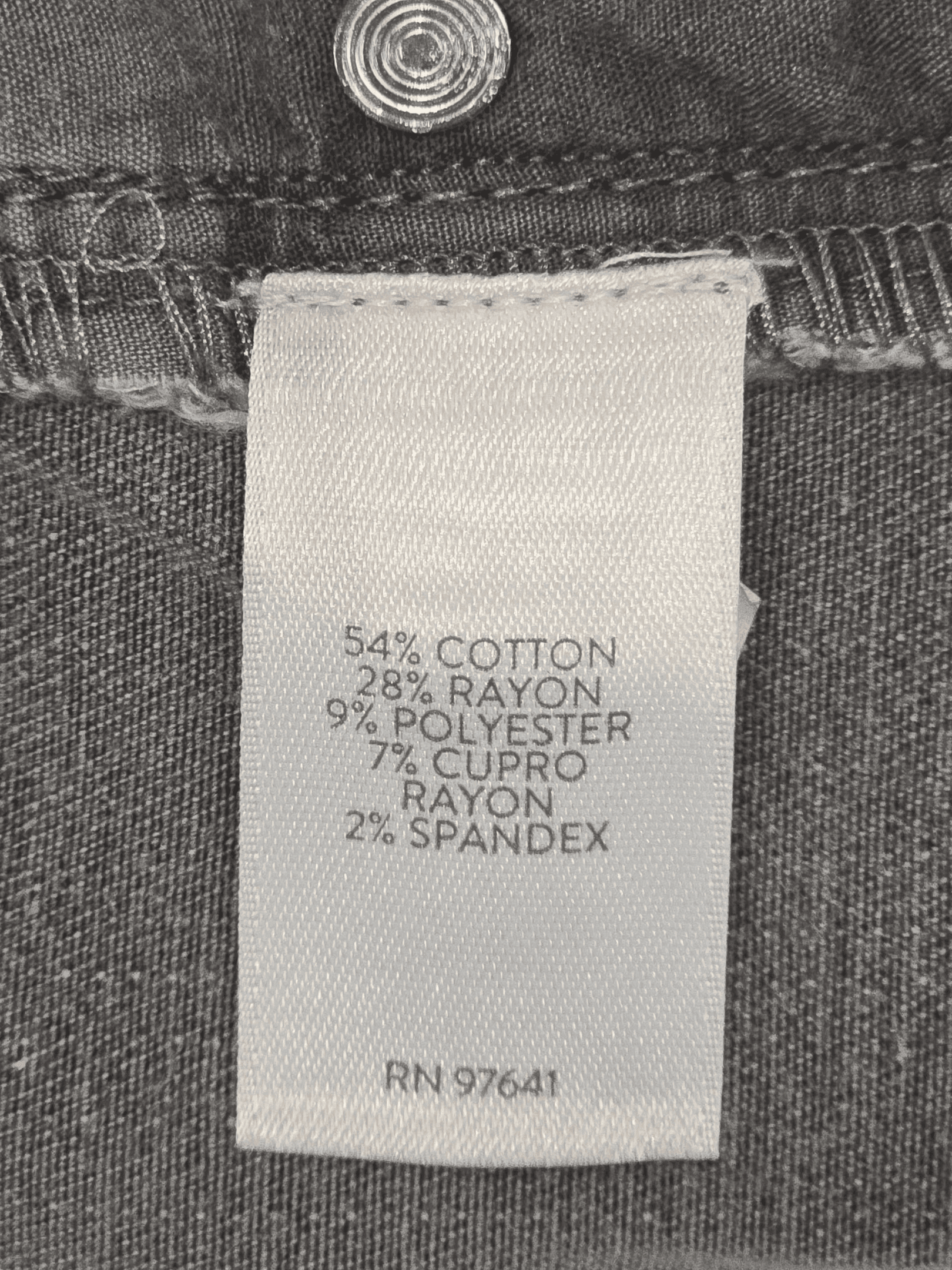 Close-up of material content and garment care tag on J. Jill women’s size 22W stretch denim capris