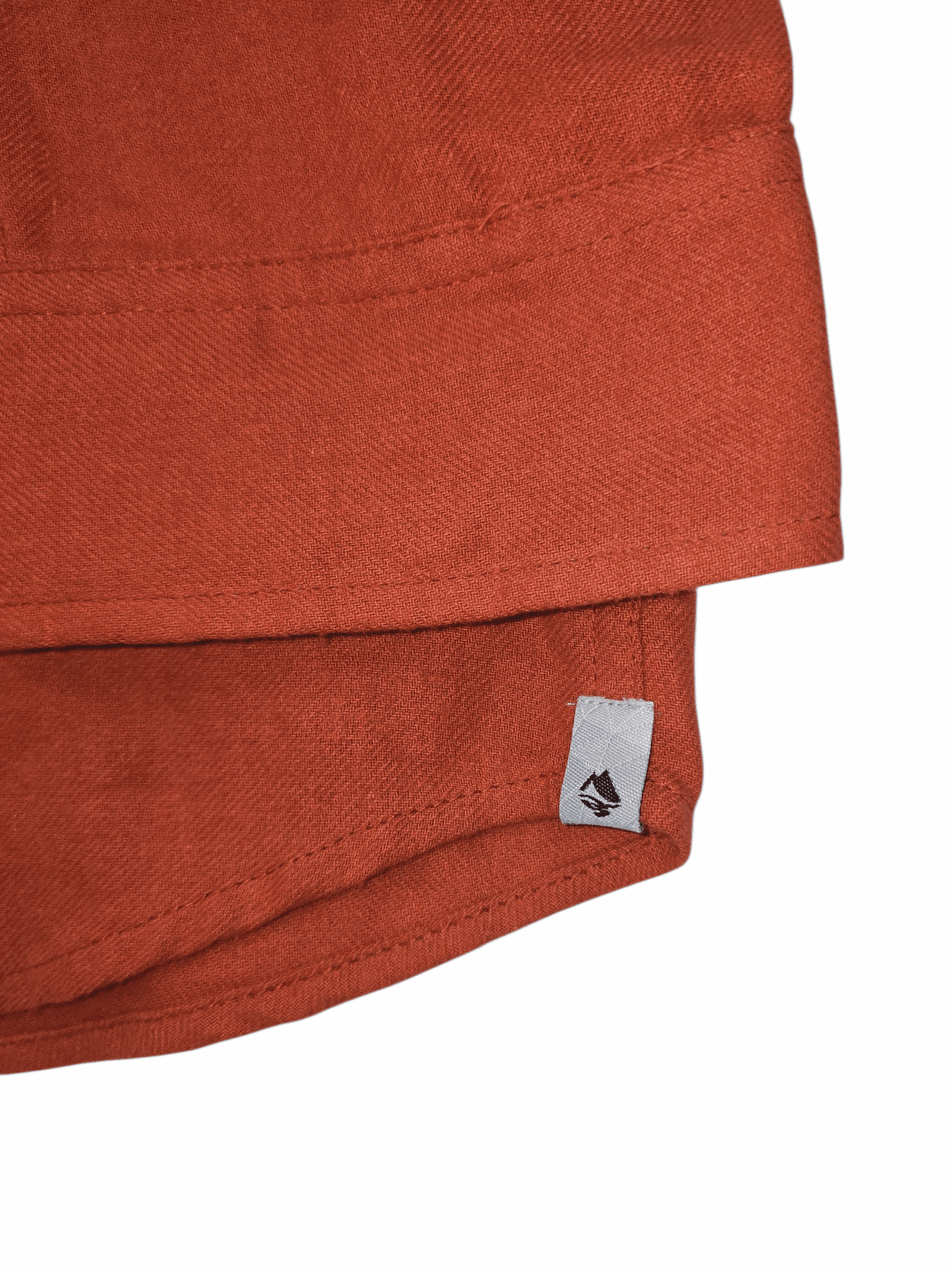 close up of the bottom of Ocean & Coast Orange Button-Up Shirt with Flap Pockets – SIZE 2XLT with logo