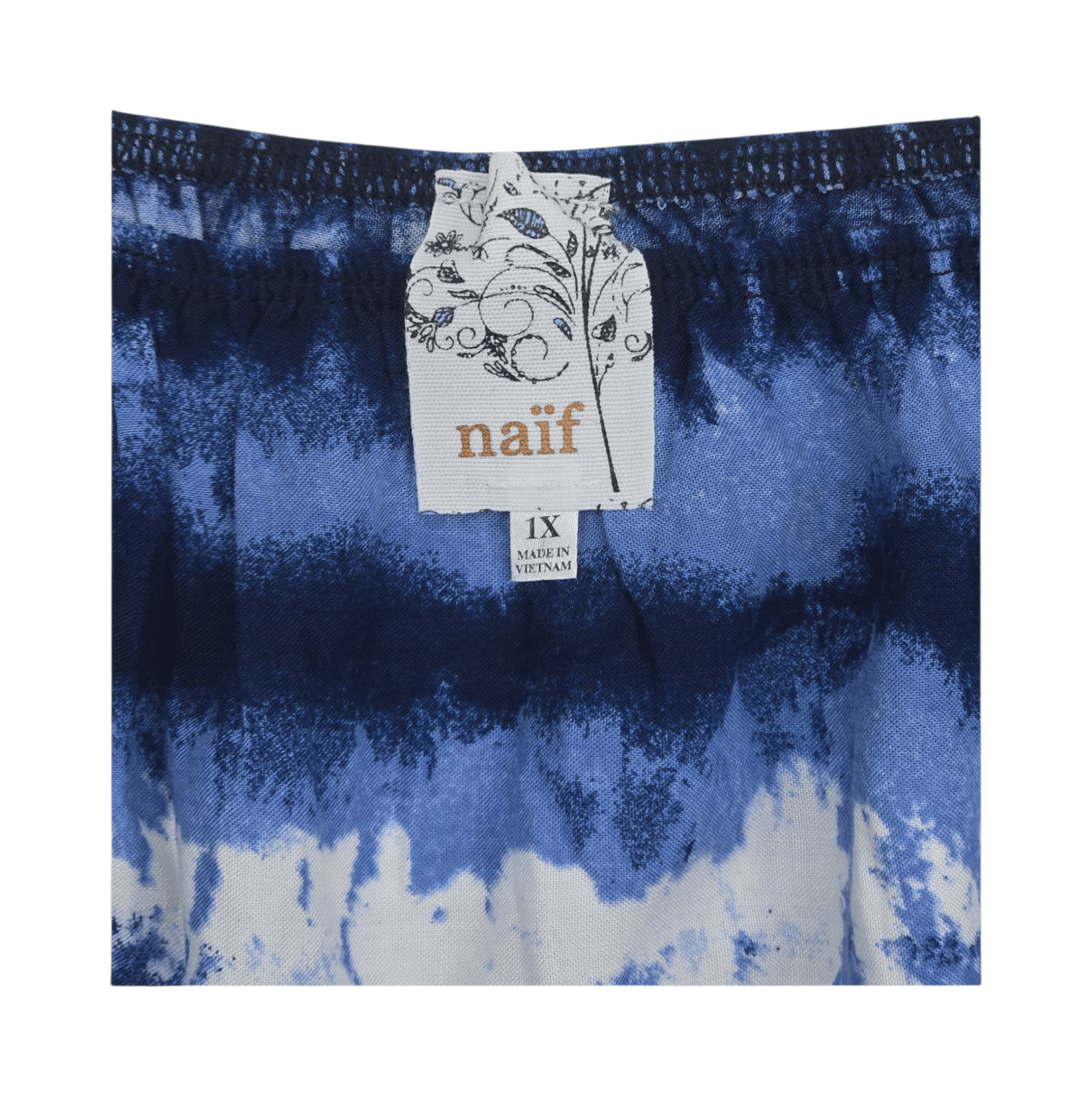 NAIF brand and size 1X clothing tag