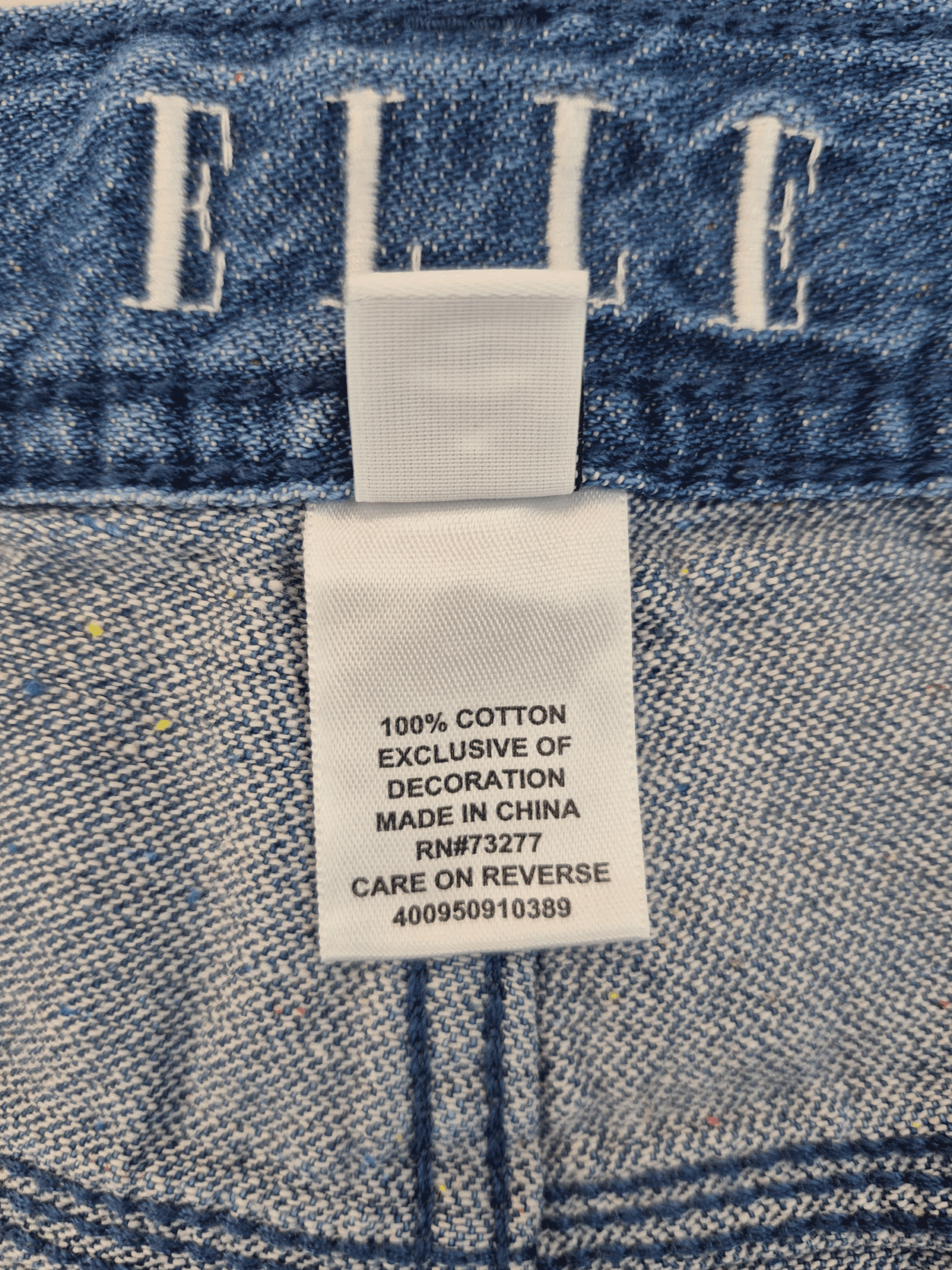 NWT ELLE distressed rolled-cuff cropped jeans material content label