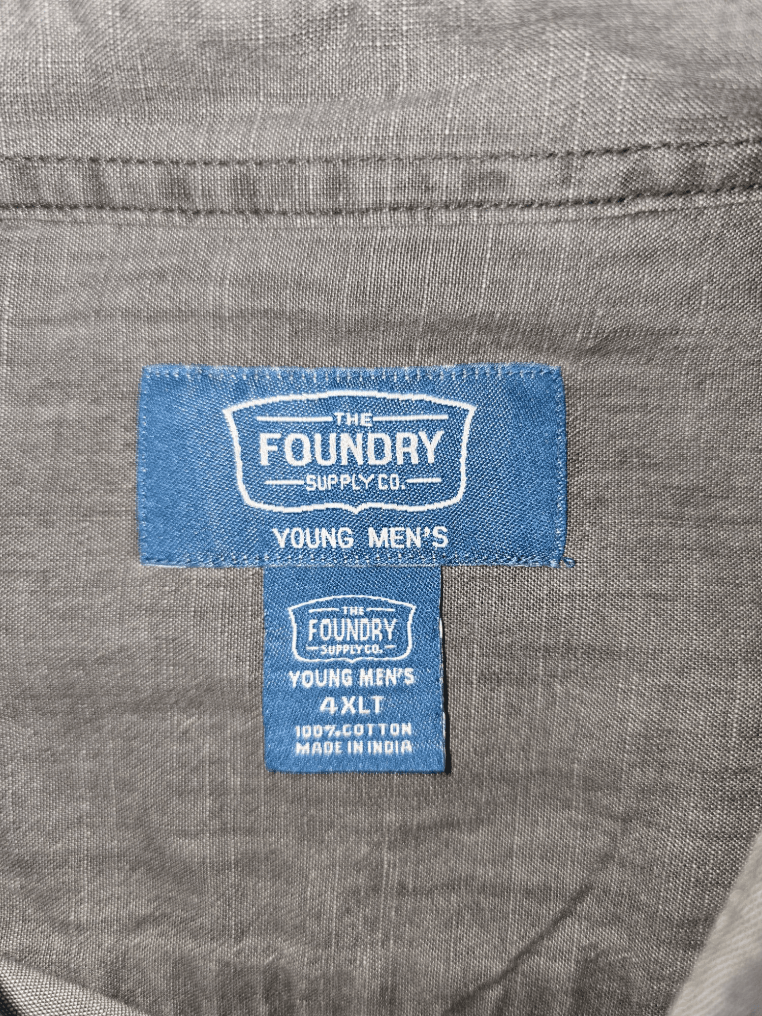 The Foundry Brand and Size Tag on Gray Button-Up Shirt Size 4XLT – Big & Tall Men’s Clothing Label