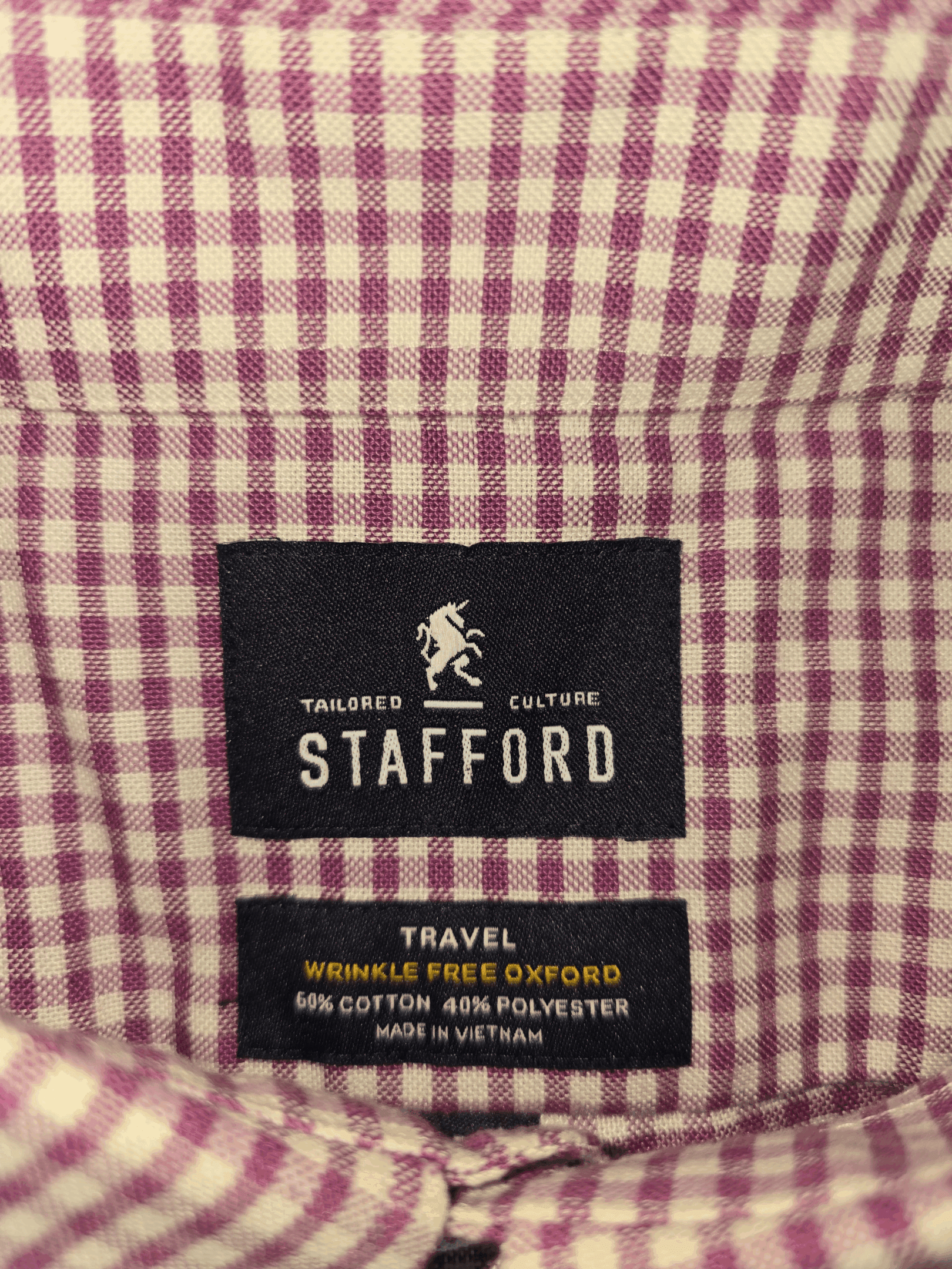 Close-up of Stafford Travel Oxford brand and size tag on men’s 4X checked shirt