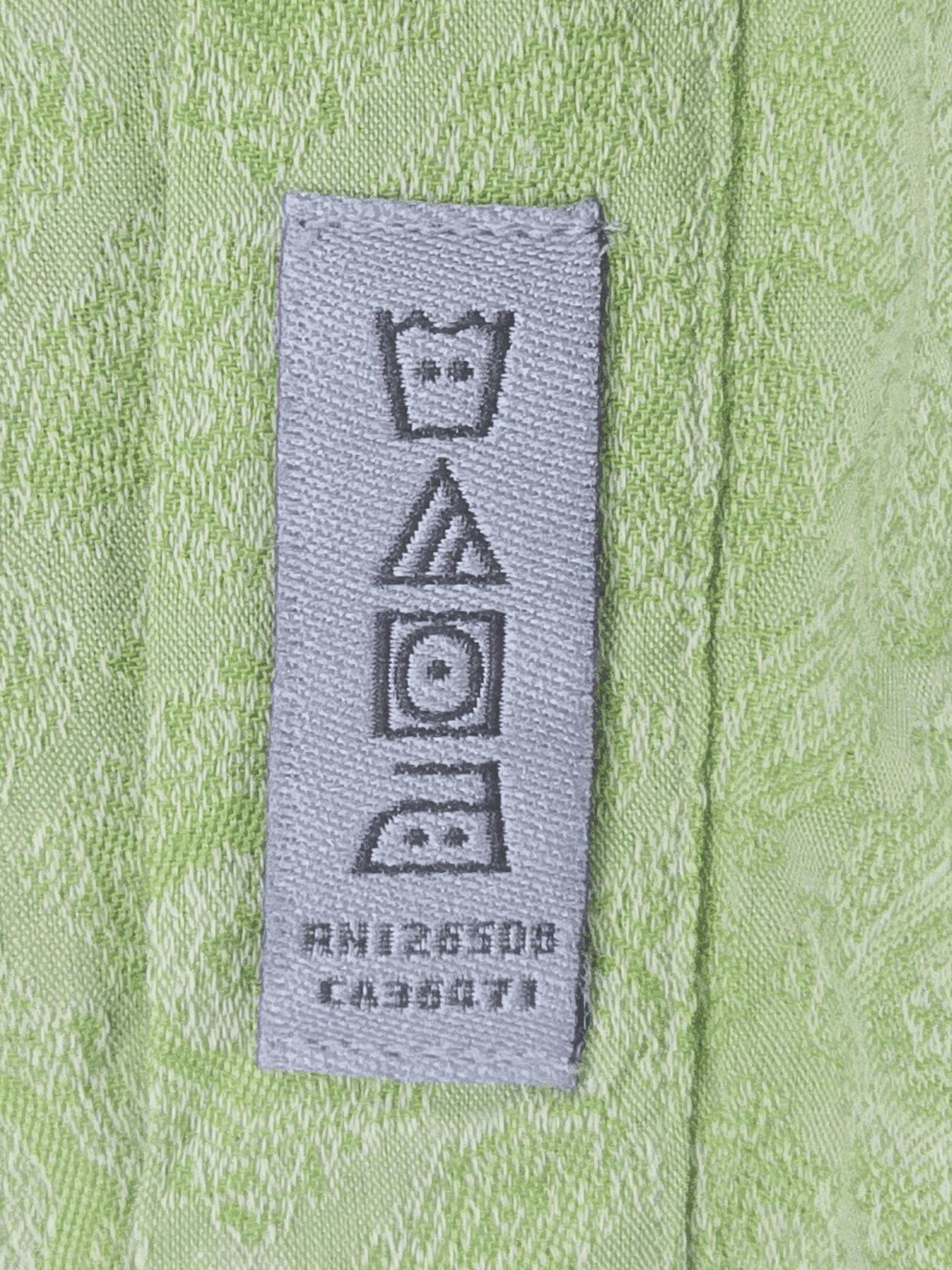 Close-up of material content and garment care tag on Thomas Dean men’s size 3XB light green jacquard Pima cotton button-up shirt