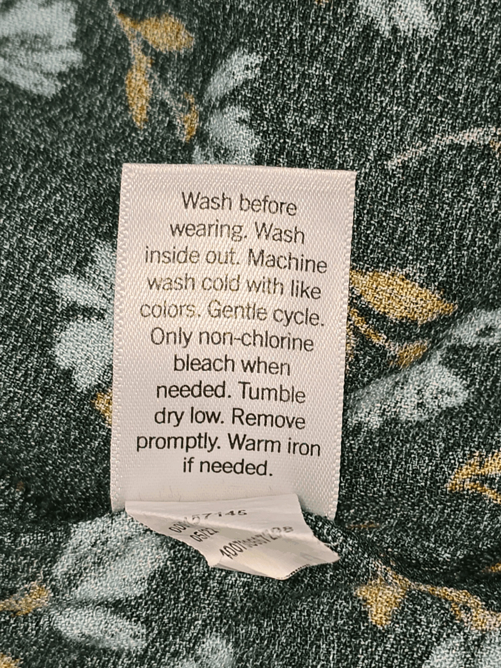 Sonoma green floral ruffle pullover blouse care instructions label