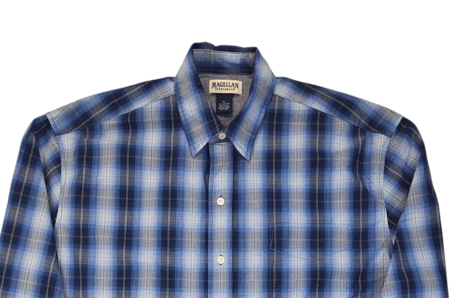 Close-up of front of Magellan Sportswear men’s XL blue plaid button-up shirt showing button and fabric details