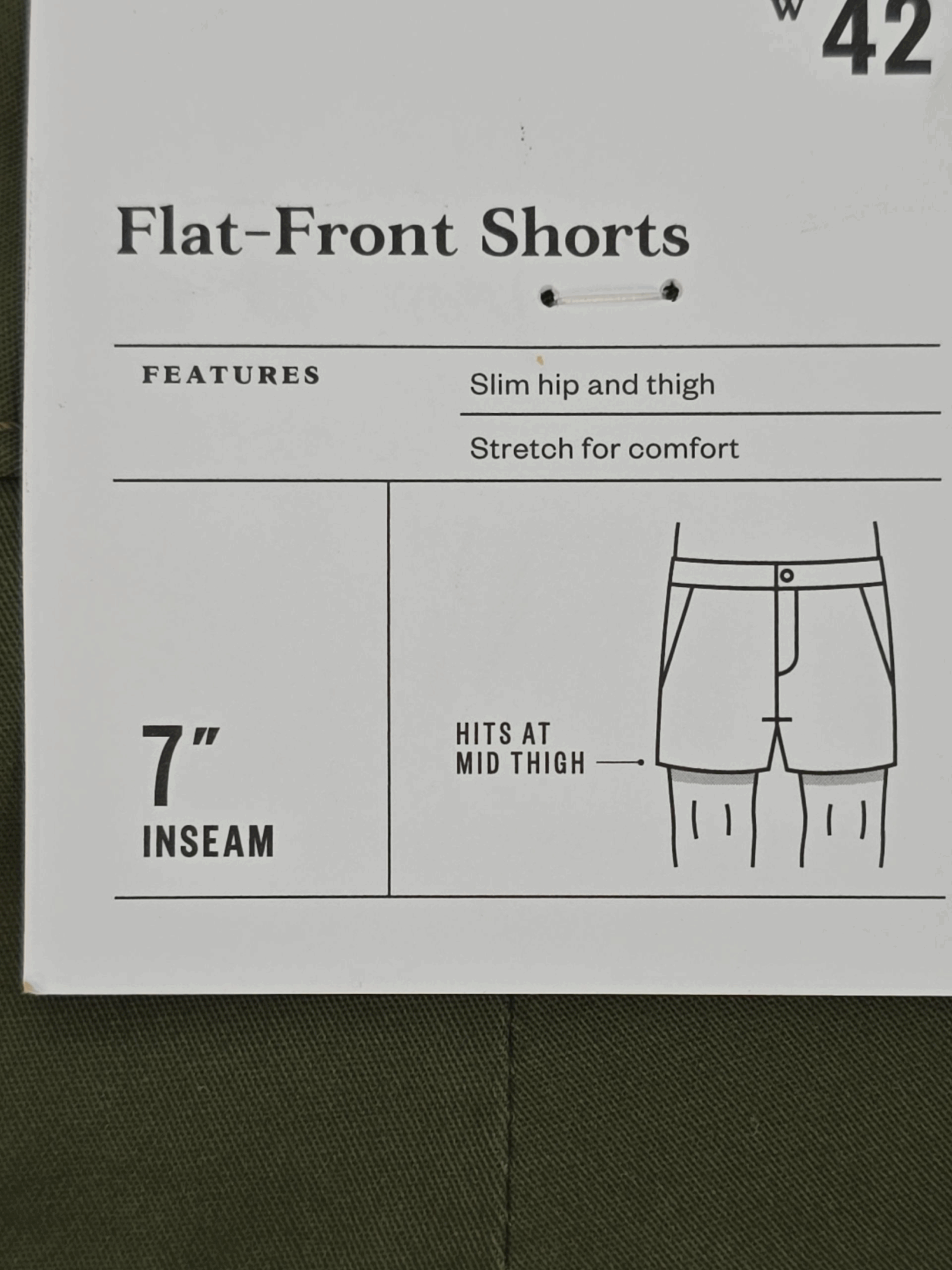 Close-up of Goodfellow & Co store tag of size 42 tag on green Everywhere shorts