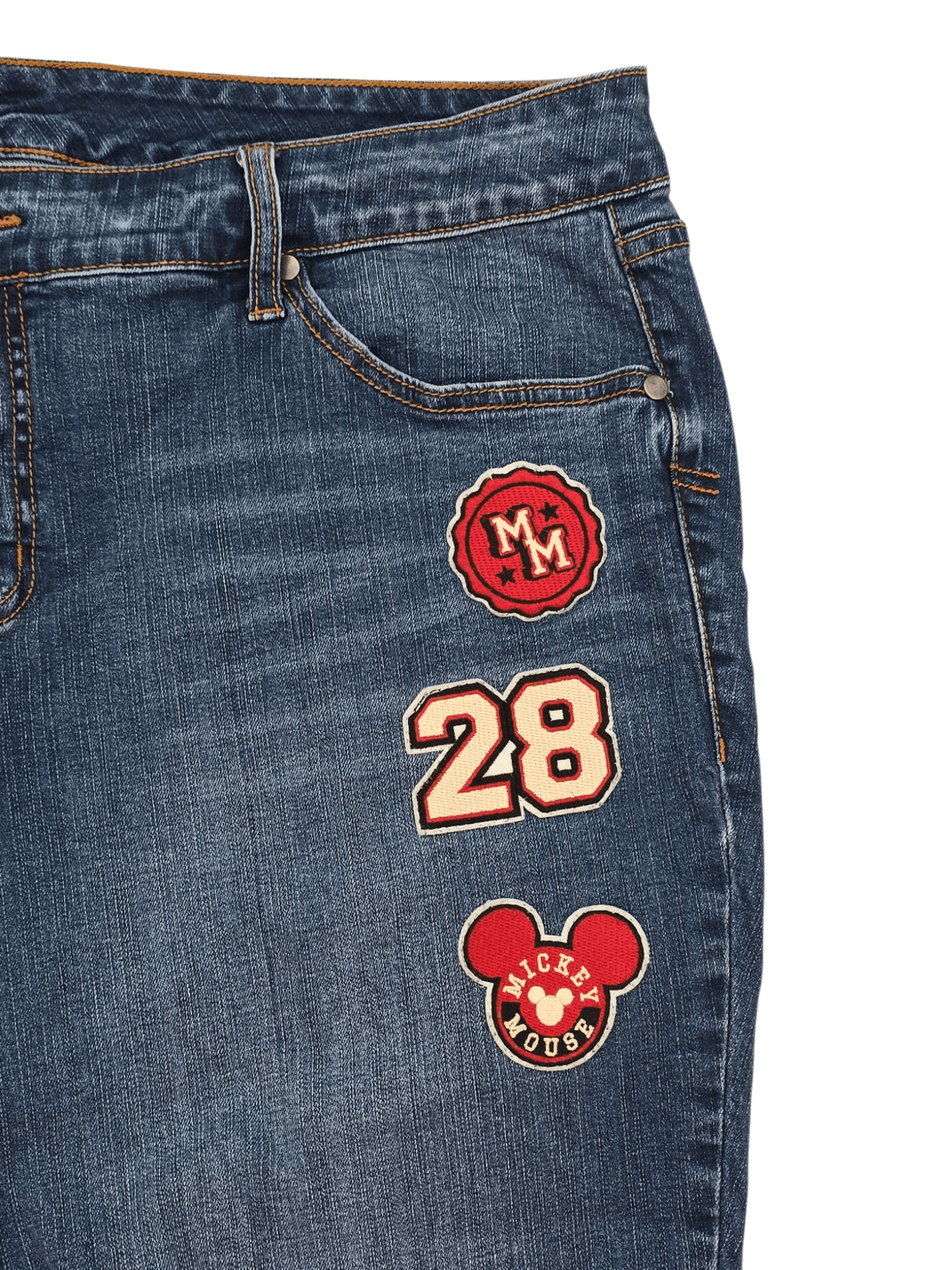 Close-up of Mickey Mouse patchwork on Disney women’s size 20 blue denim cropped jeans