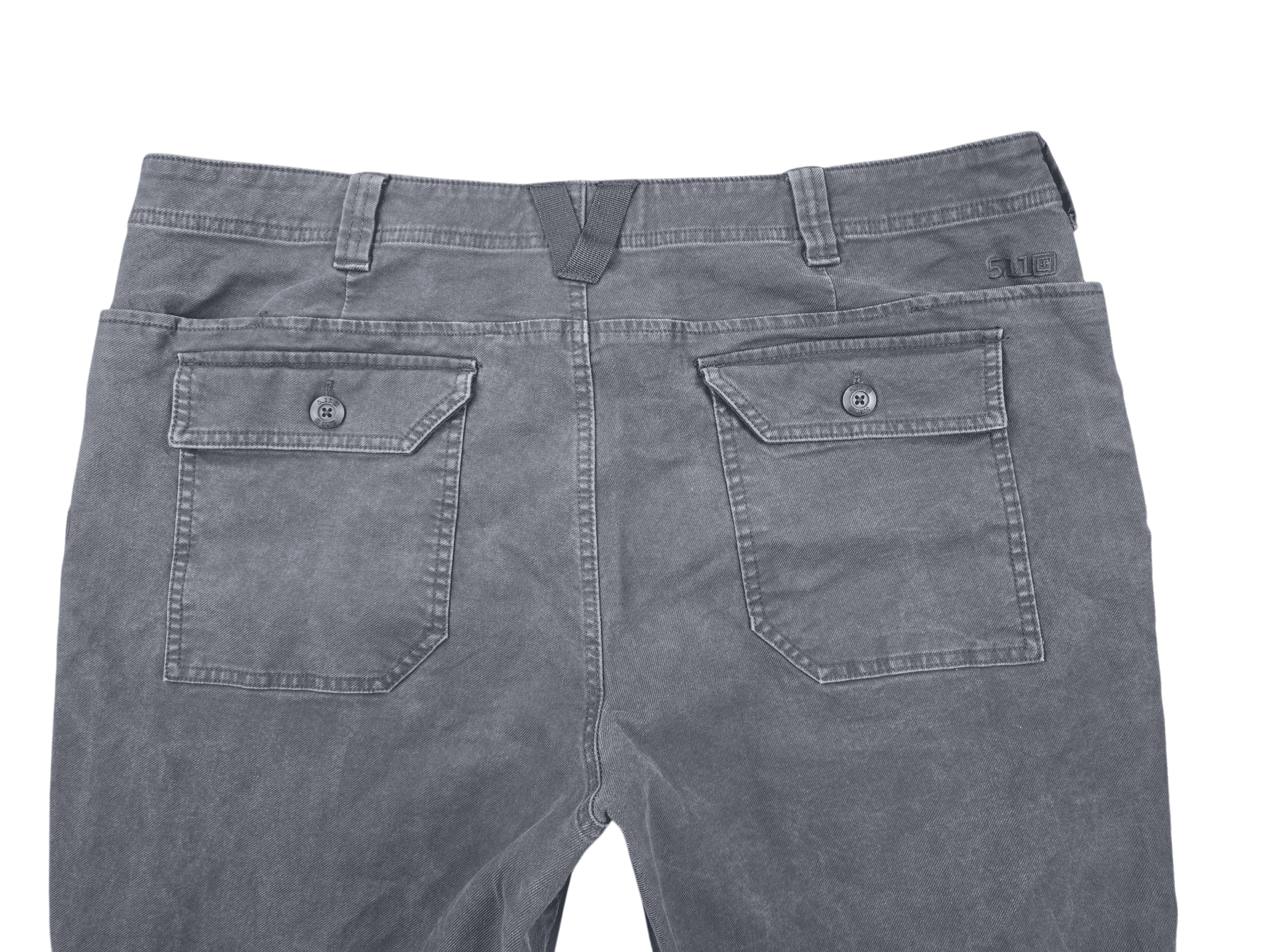Close-up of back of 5.11 Tactical men’s size 42x30 gray twill stretch pants showing waistband, zipper, and pocket detail
