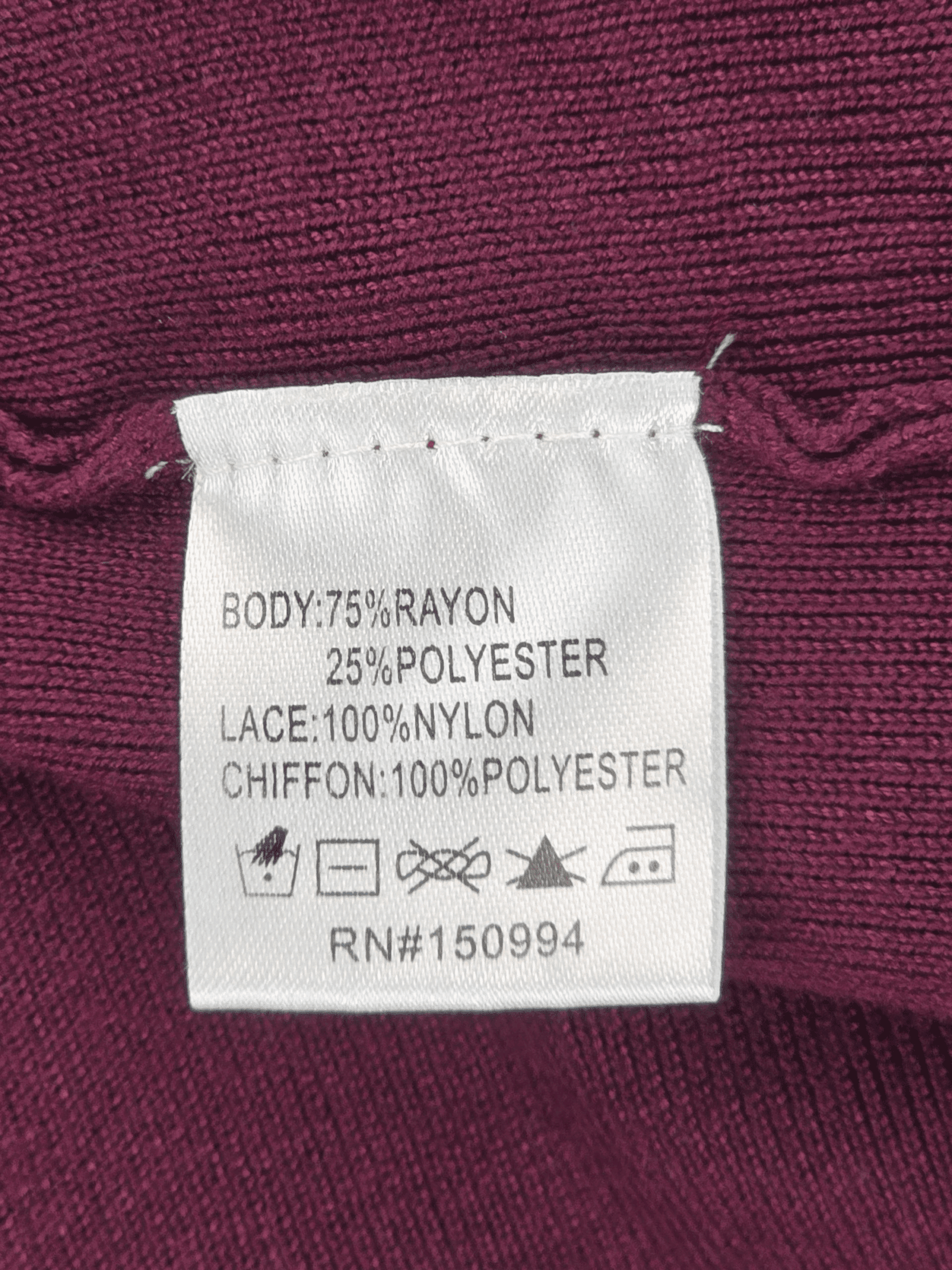Belldini wine keyhole pullover sweater material content label