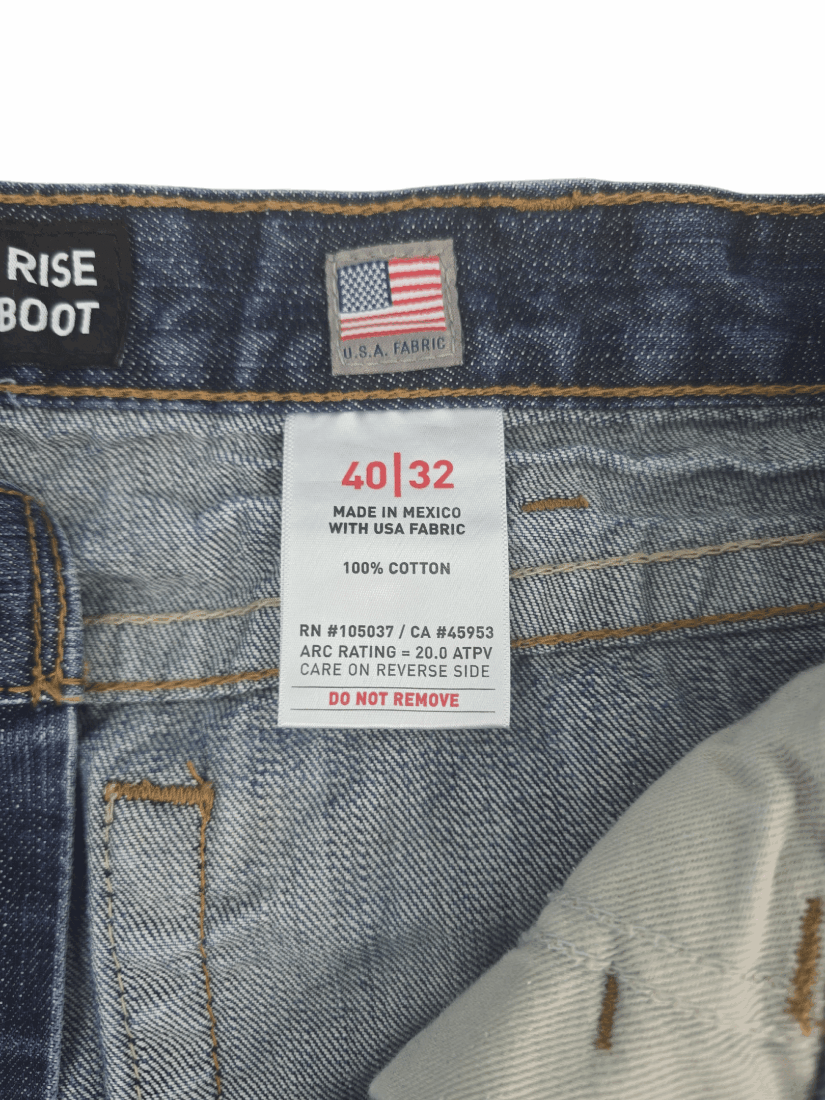 Close-up of Ariat brand and FR label on M4 low-rise bootcut jeans size 40x32