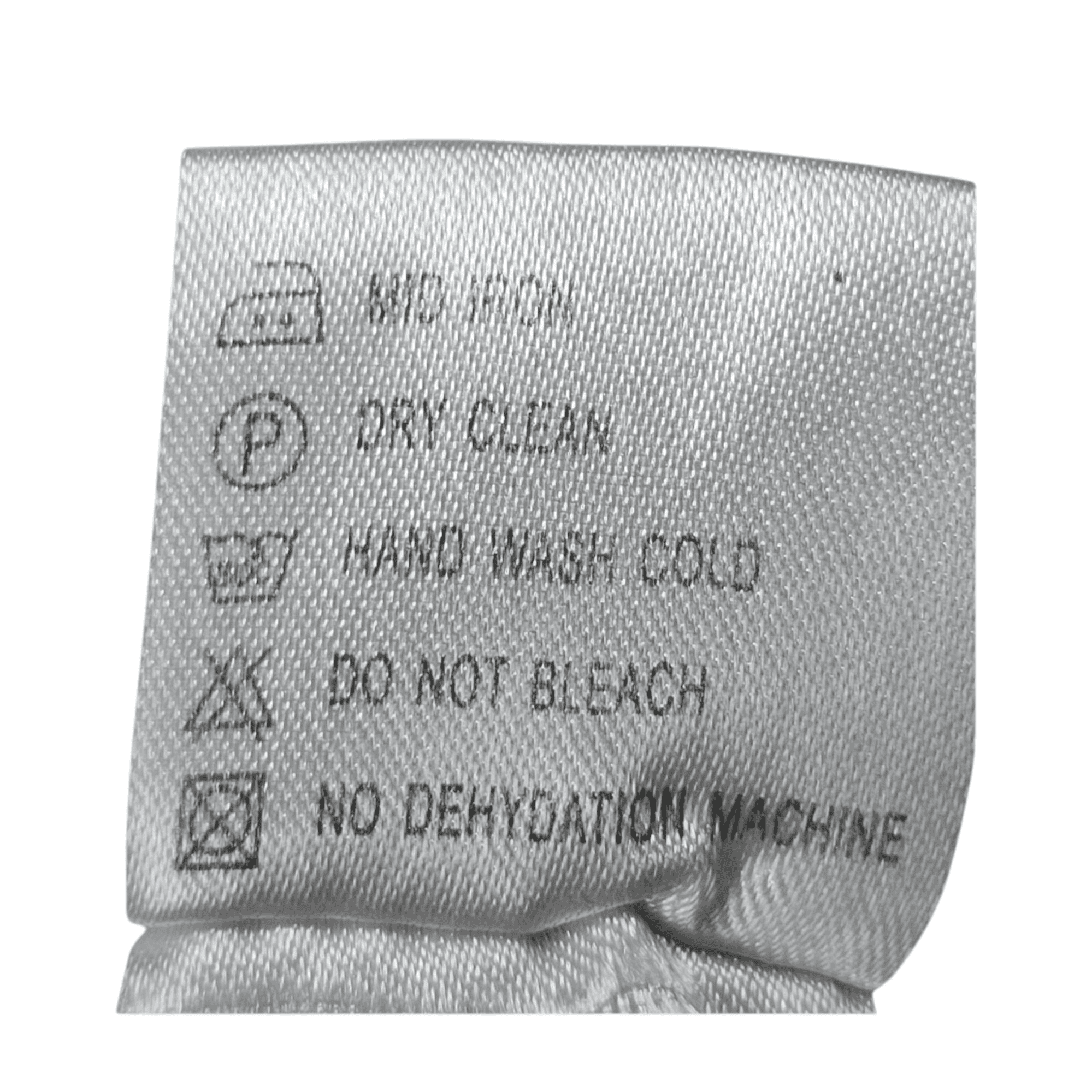 Roundtree & Yorke green and gray micro-geometric pleated shorts care instructions tag