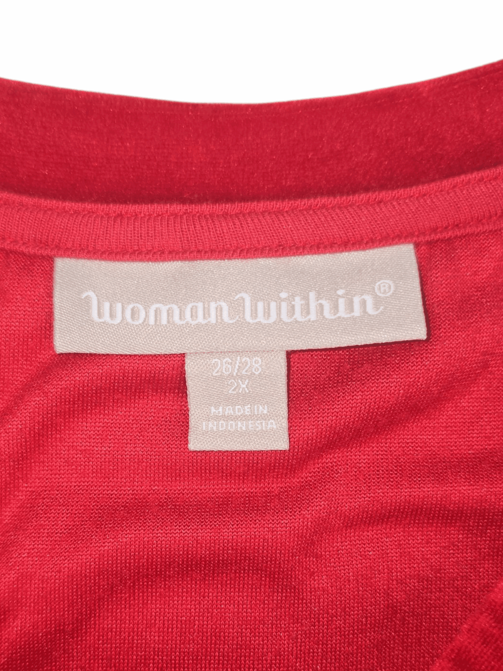 Close-up of Woman Within brand and 2X size tag on red velour pullover top