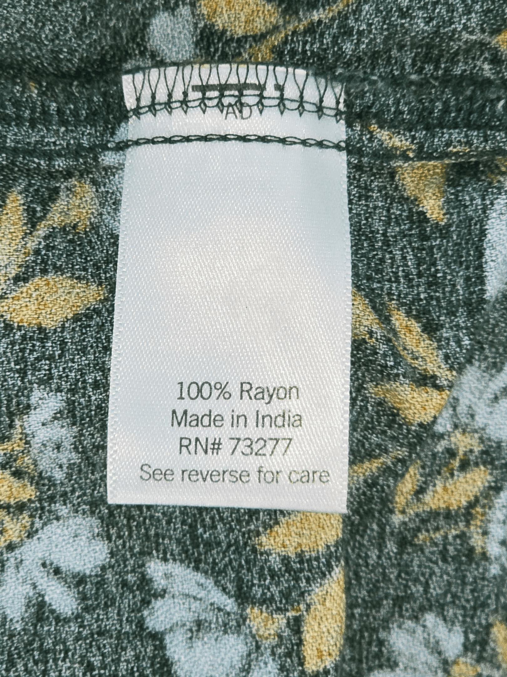 Sonoma green floral ruffle pullover blouse material content label