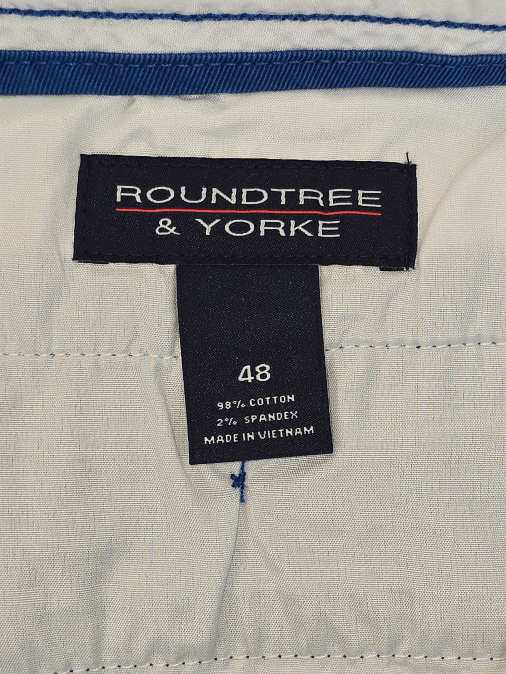 Roundtree & Yorke brand and size 48 clothing tag