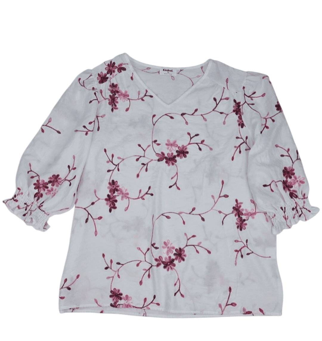 Front view of Kindred white and pink floral embroidered V-neck top size 2X