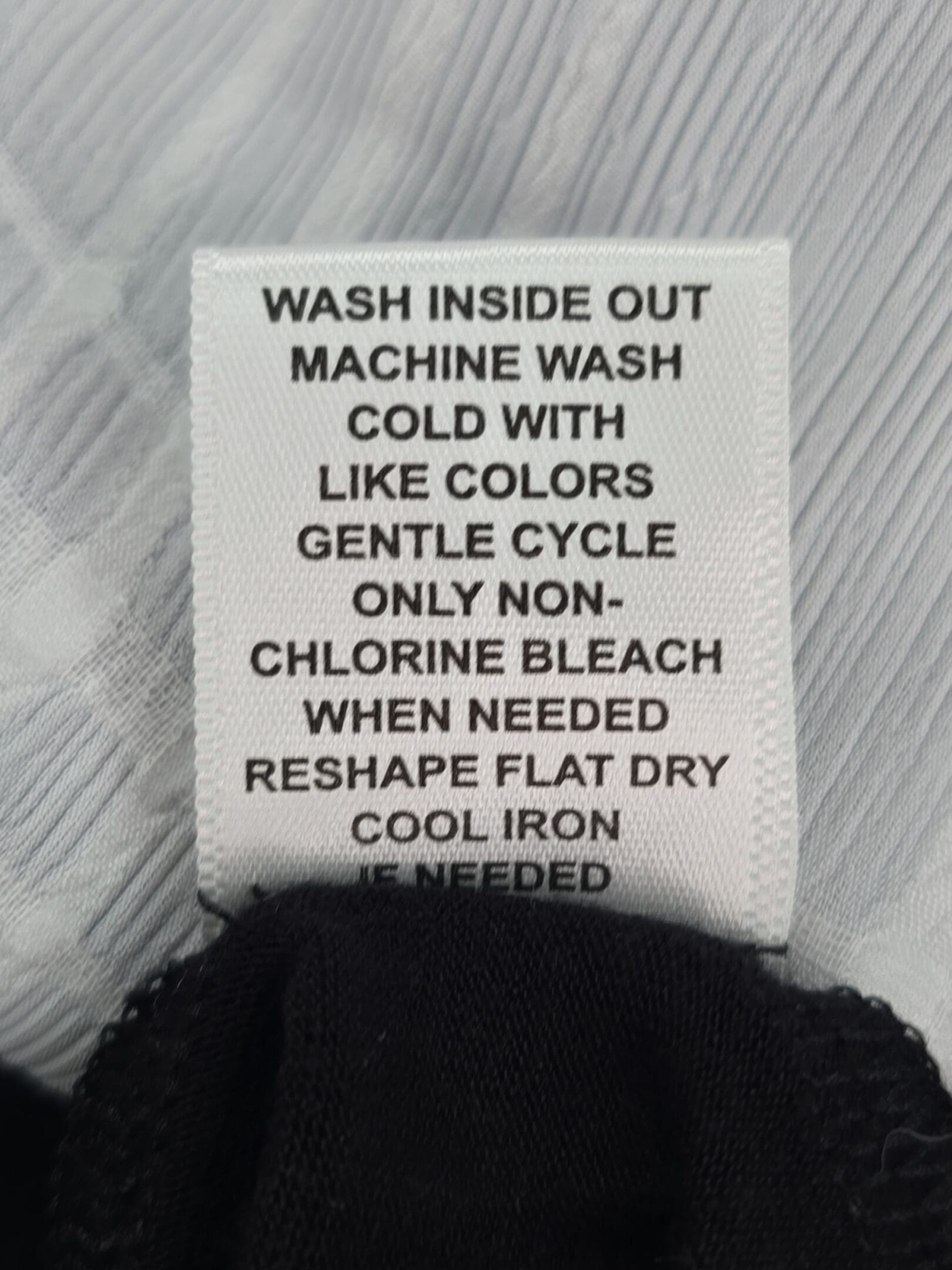 ELLE washing care instructions tag
