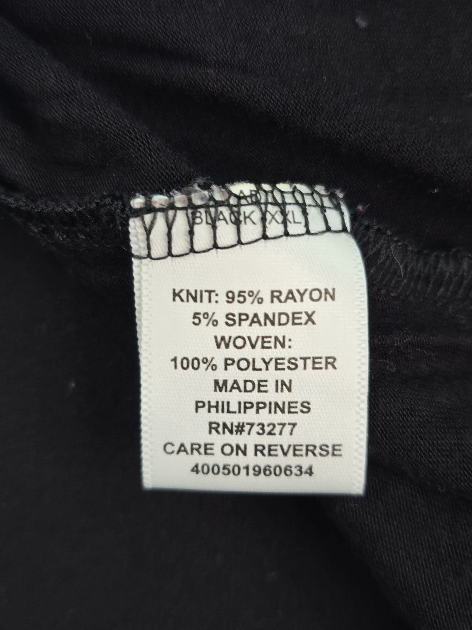 ELLE fabric content tag showing rayon polyester blend
