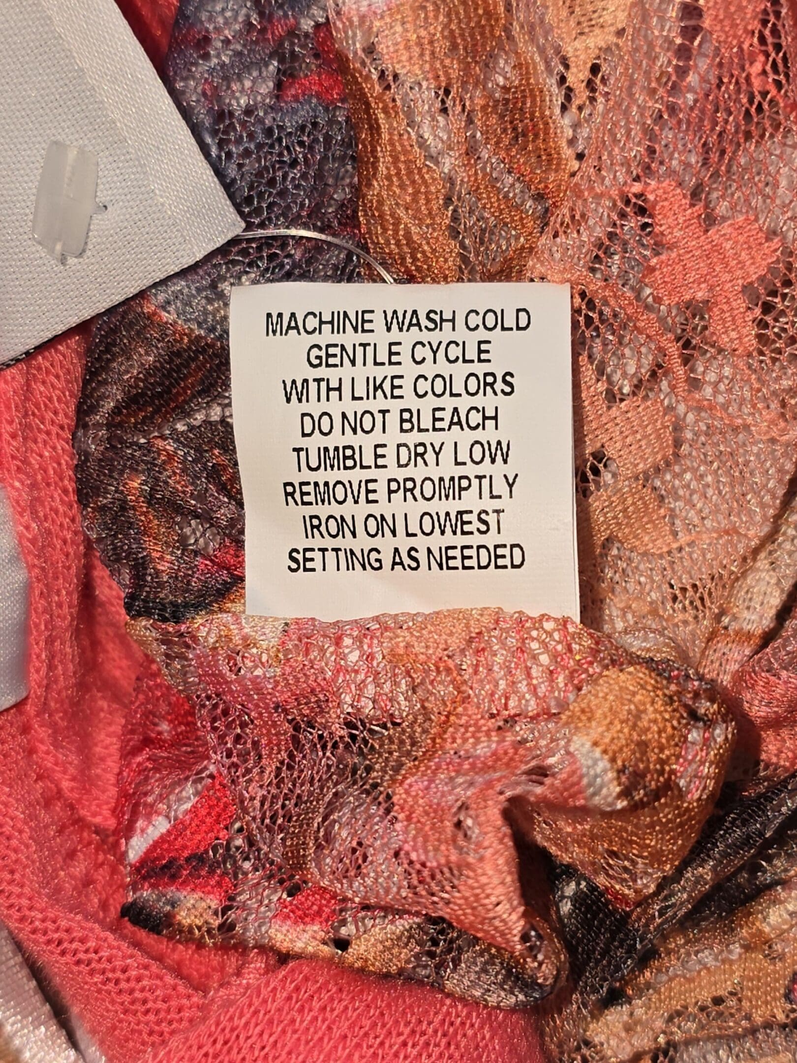 Kim Rogers top with scarf care instructions tag