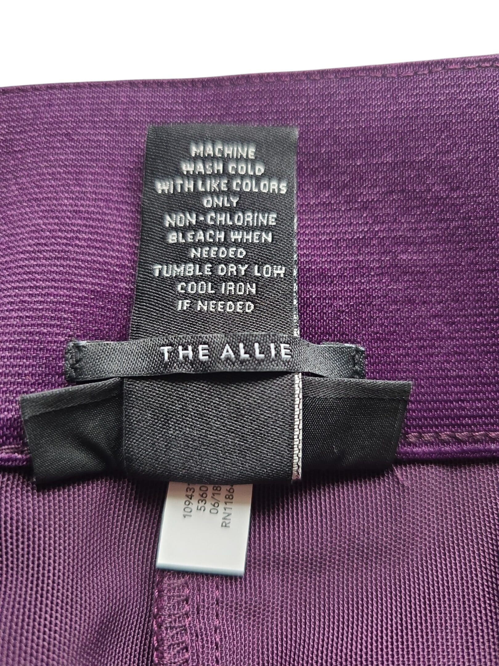 Lane Bryant purple cropped pants care instructions tag