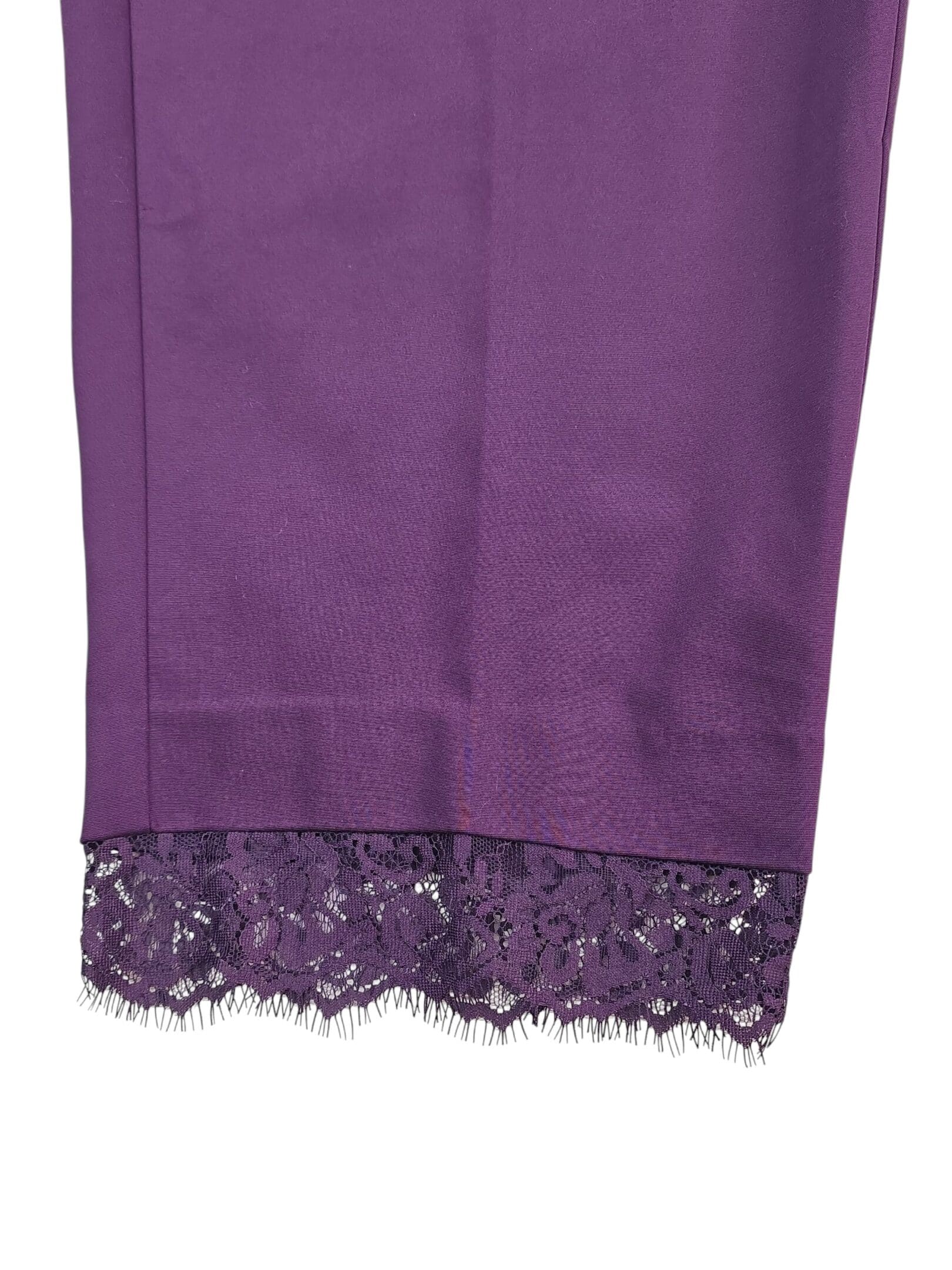 Lace hem detail on purple cropped pants by Lane Bryant