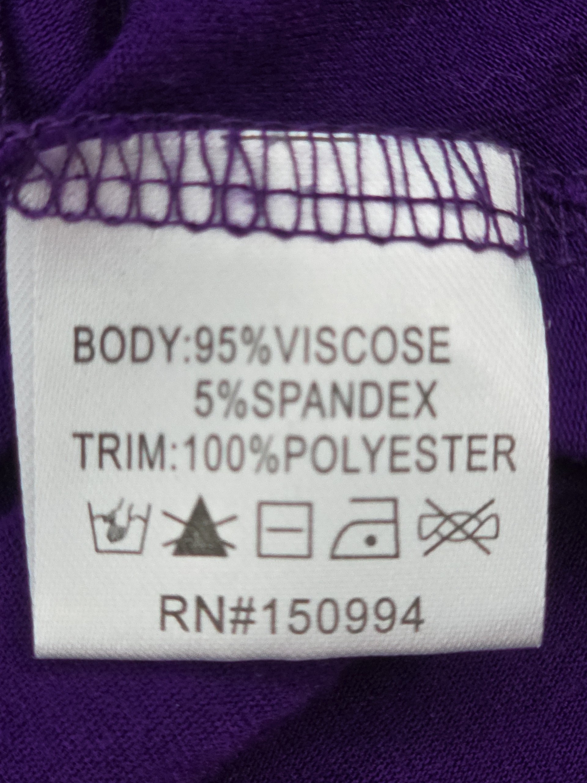 Material content and care instructions tag on Belldini blouse
