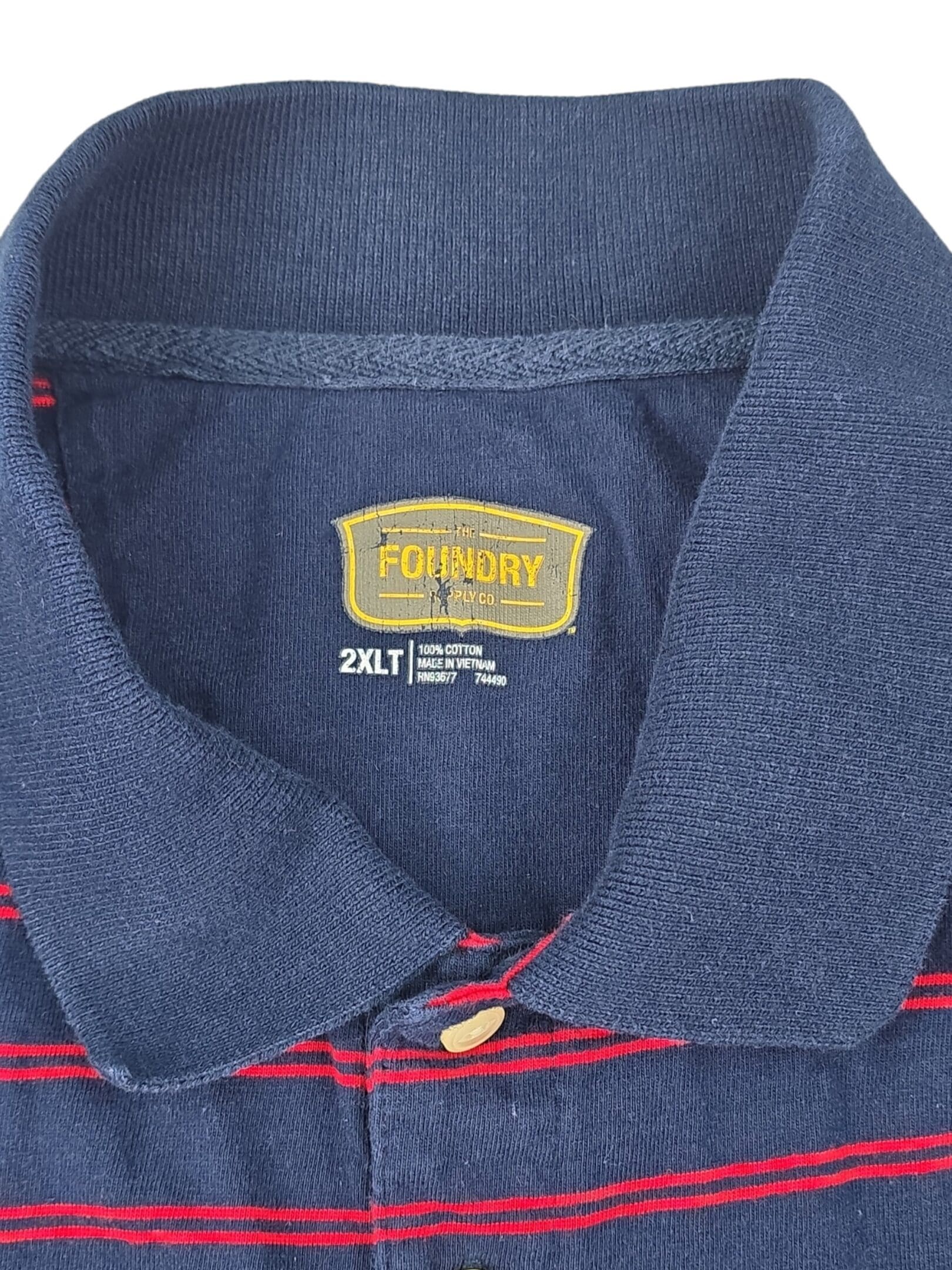 Foundry Supply Co men’s polo shirt 2XLT tag showing 100% cotton material content
