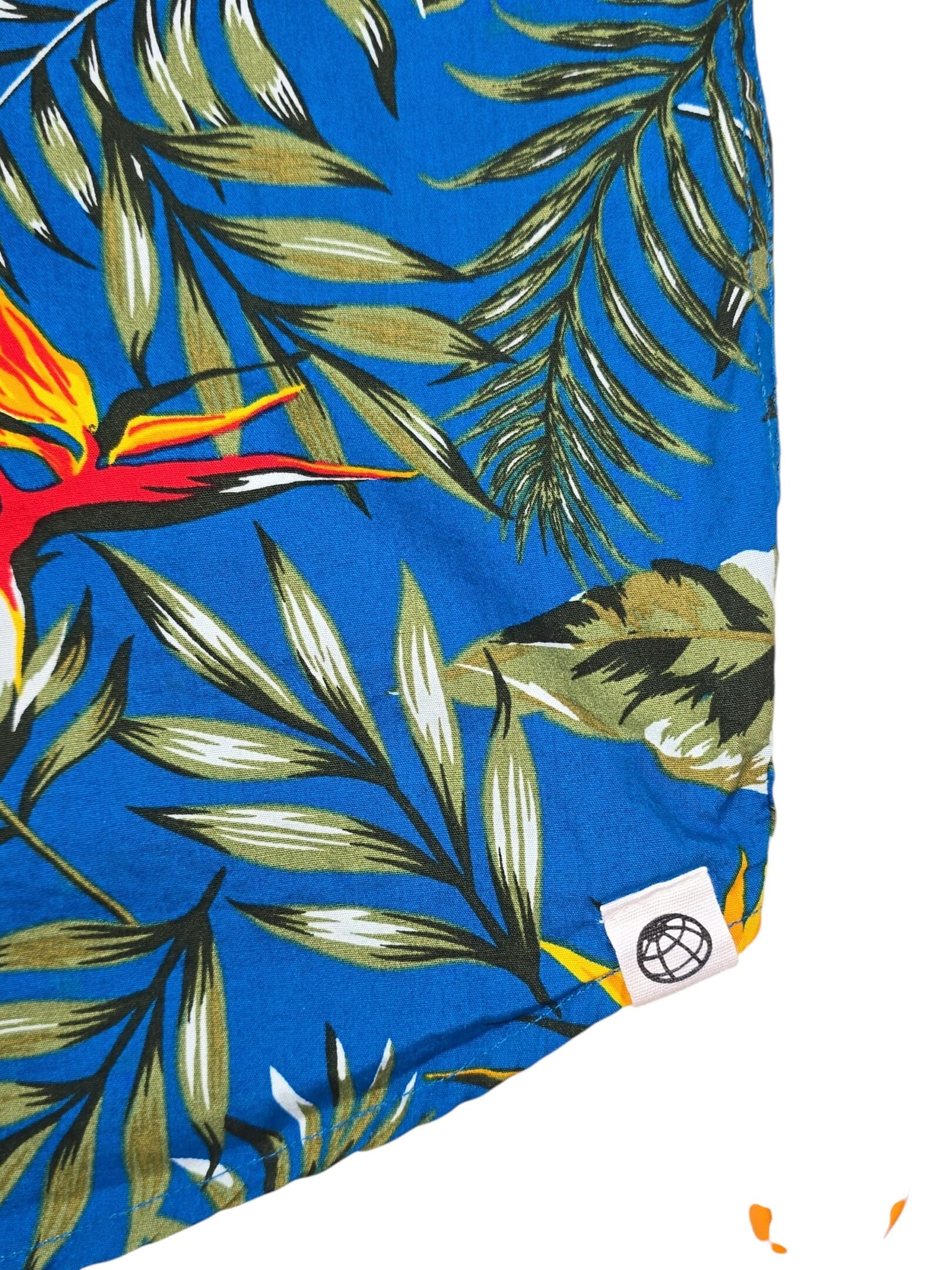 Free Planet shirt hem logo tag close-up