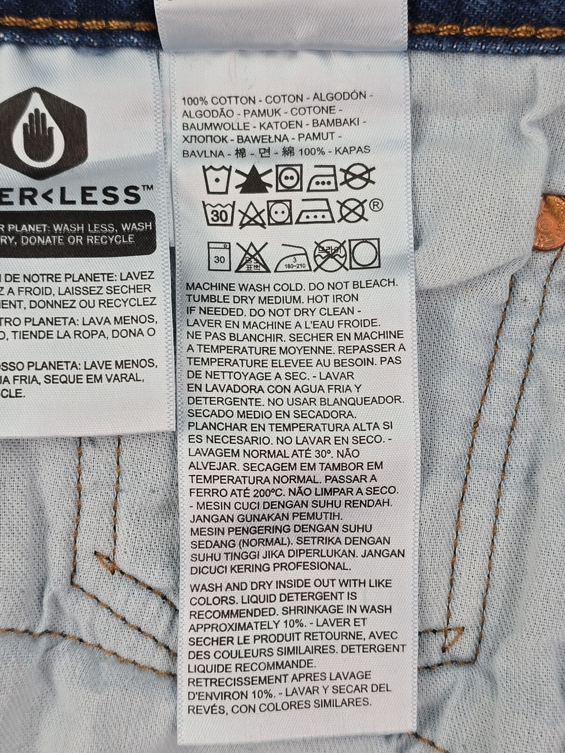 Material content and care instructions tag on Levi 541 jeans