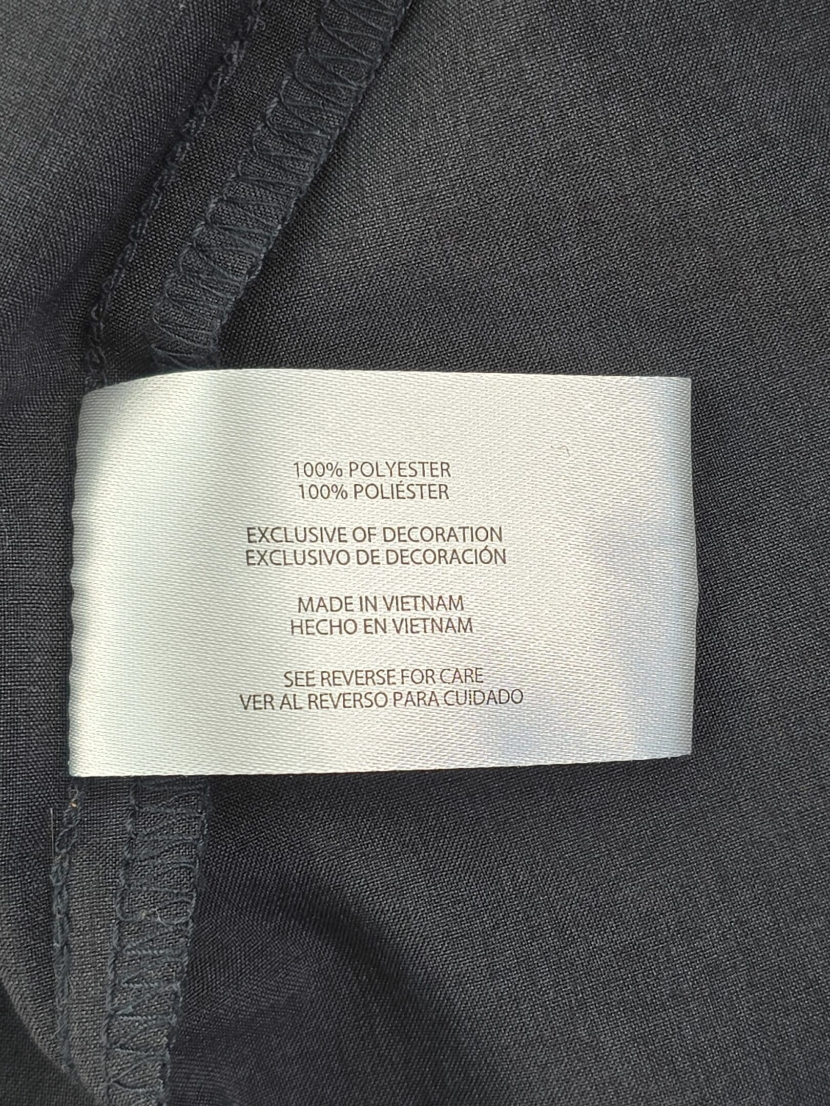 Orvis shirt material content tag 100 percent polyester