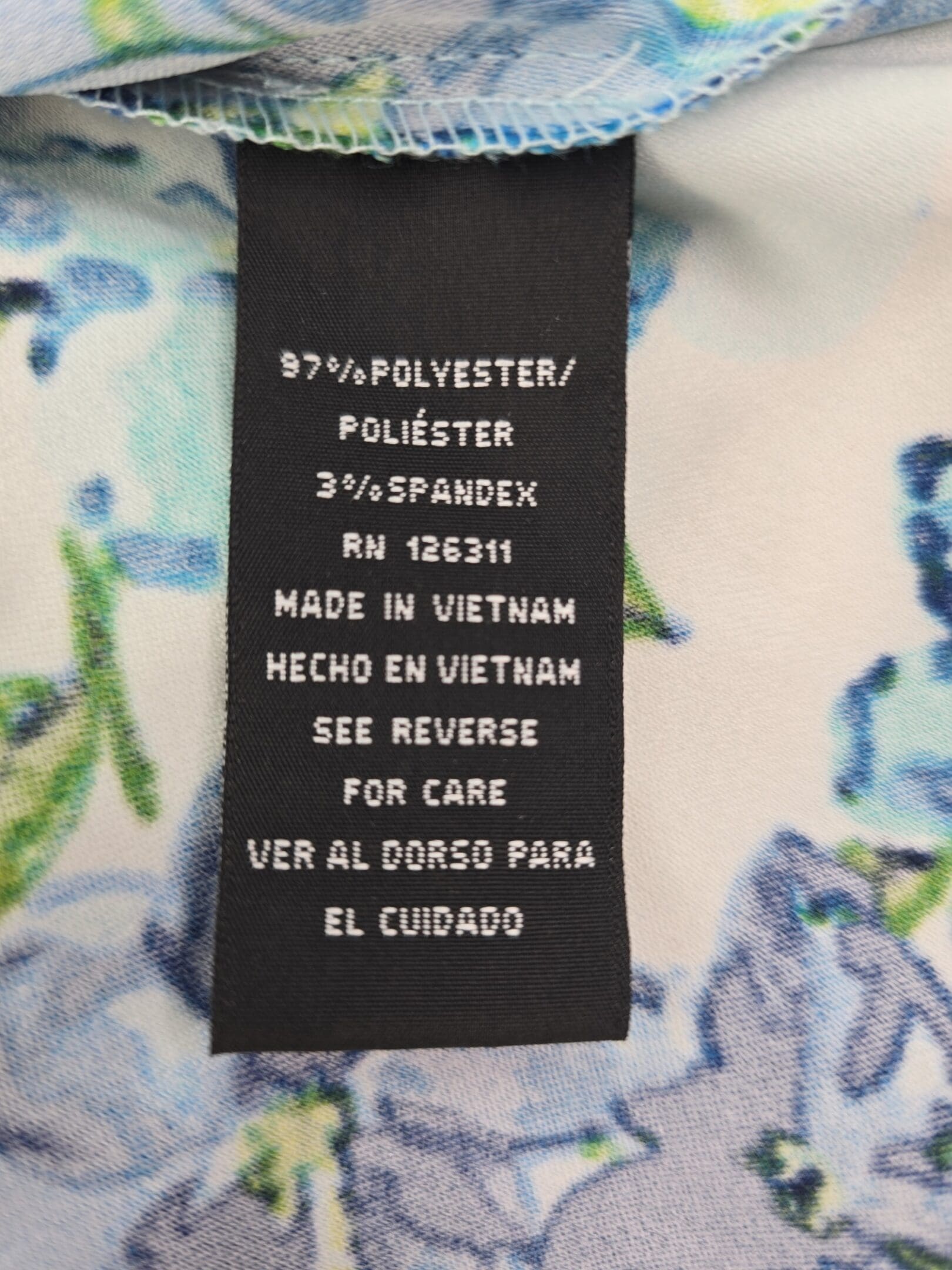 Fabric content tag listing 97 percent polyester and 3 percent spandex