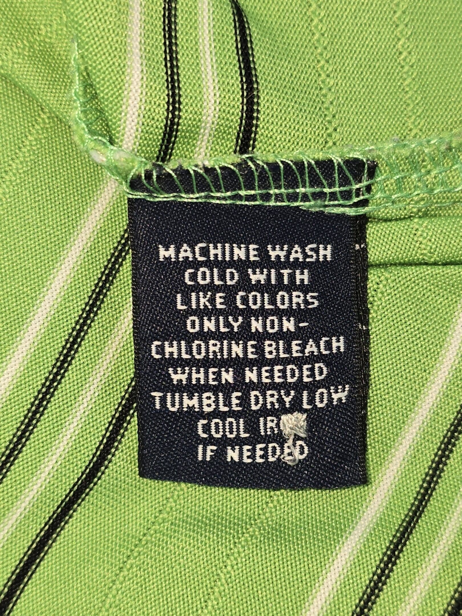 Roundtree & Yorke men's polo shirt care instructions tag