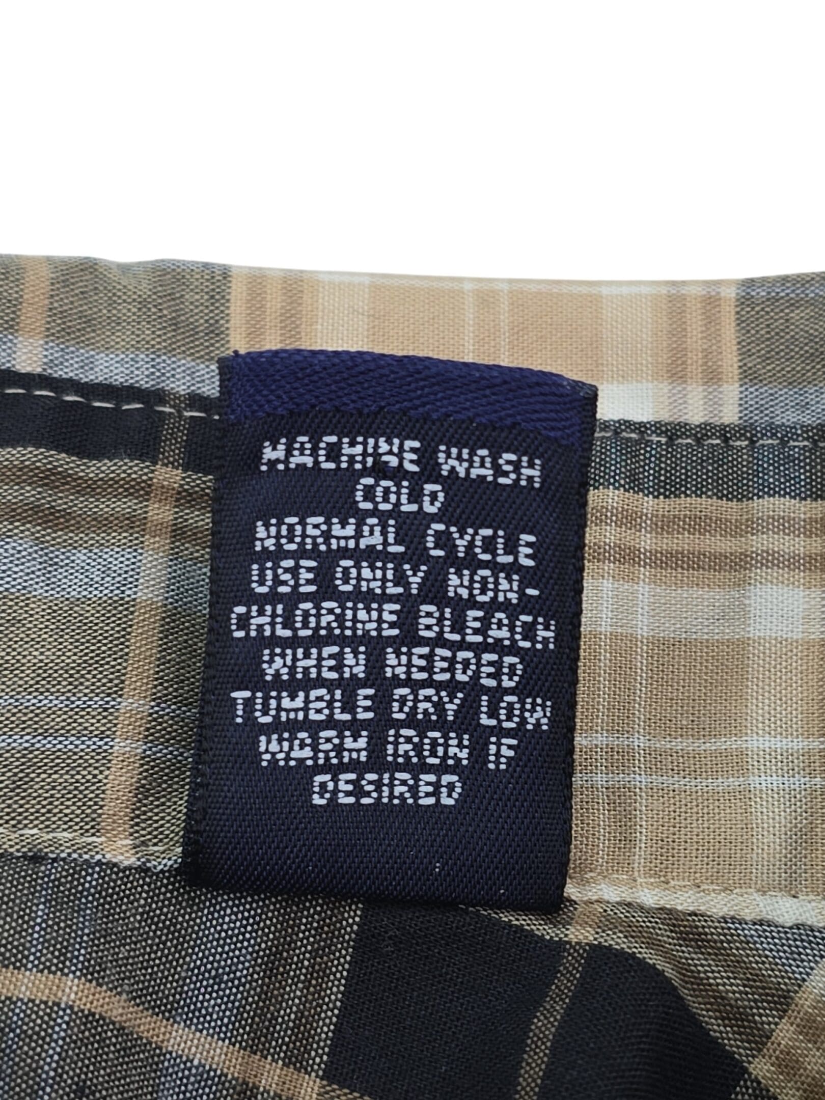 Easy care men’s 2XLT shirt care tag tumble dry low instructions