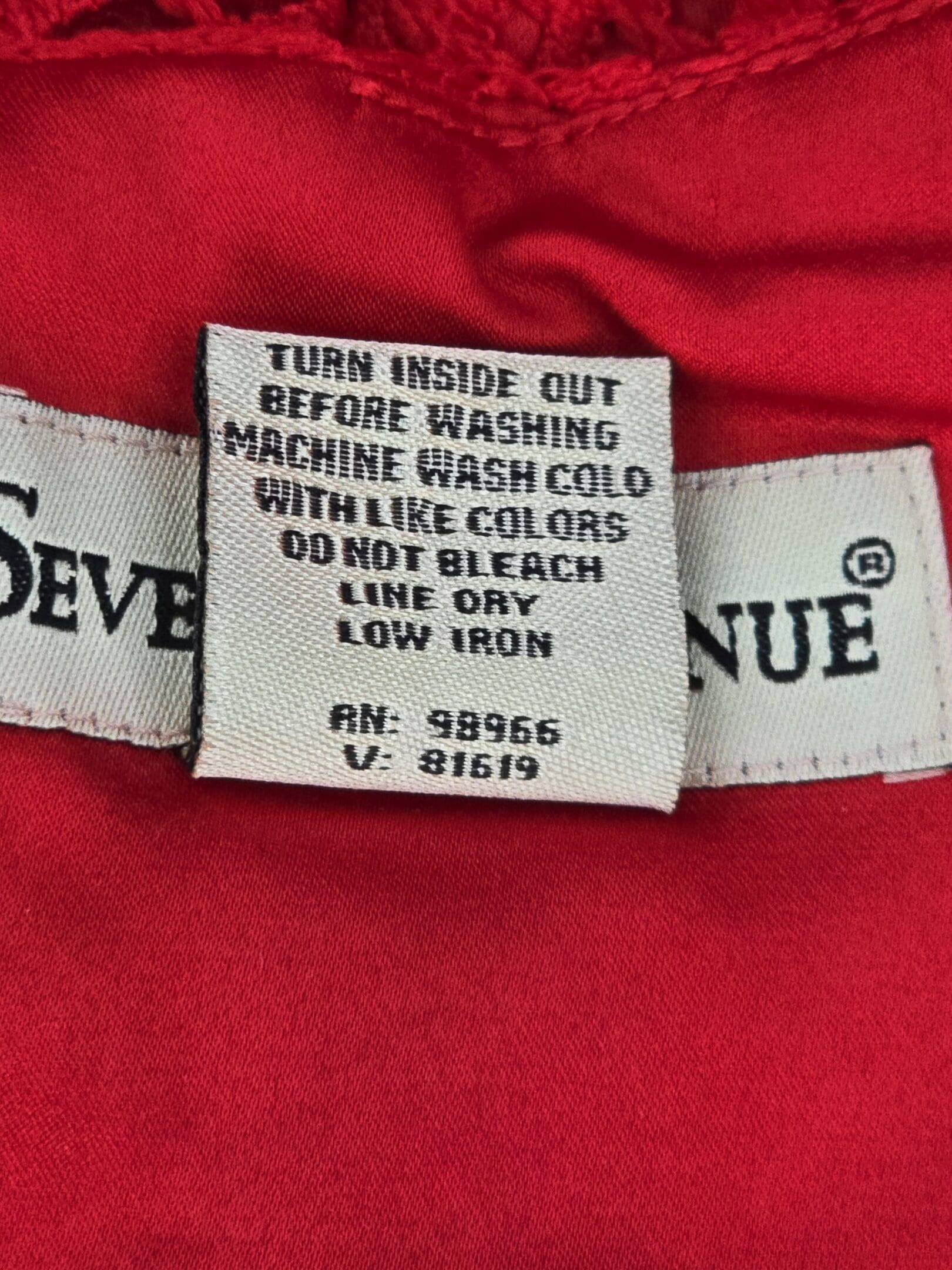 Fabric content and care instructions for Seventh Avenue red dress 3X