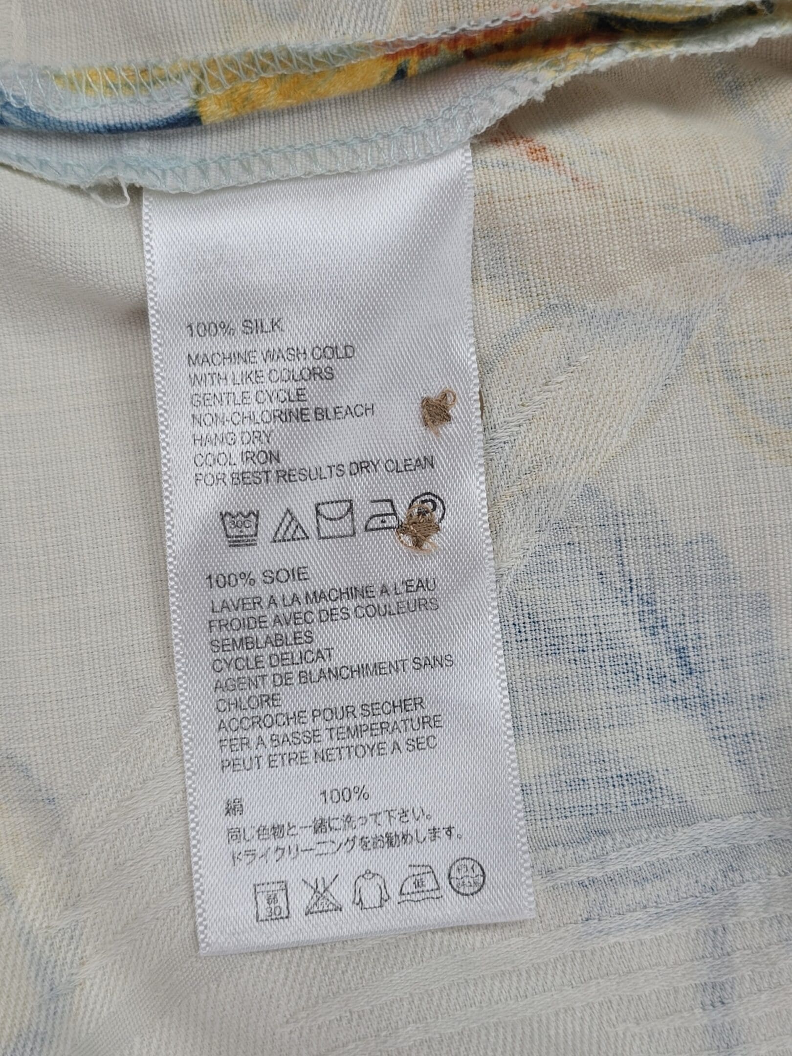Tommy Bahama 100% silk shirt care label close-up