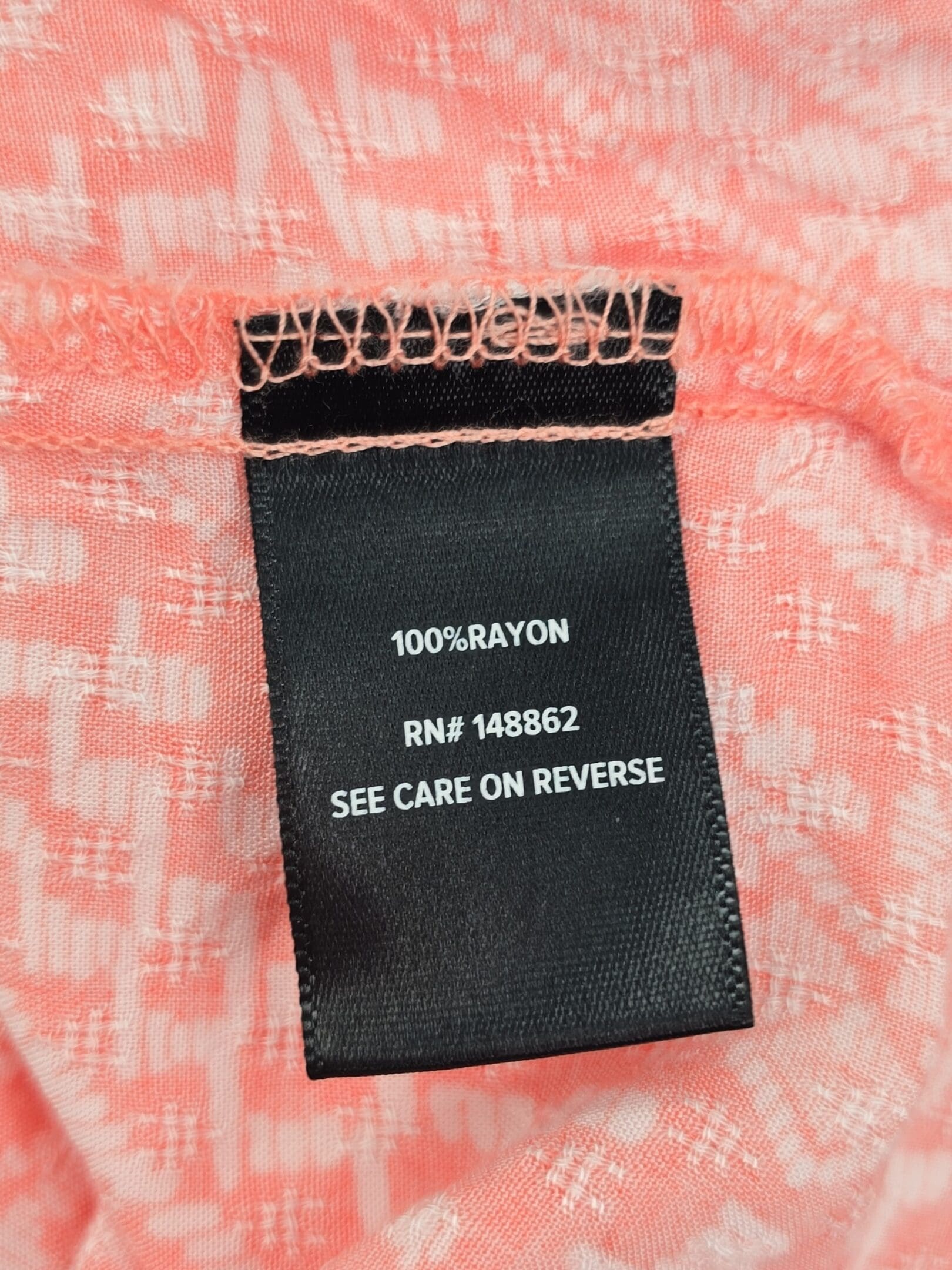 Torrid top material tag 100% rayon