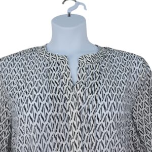 Up close front view of Vince Camuto women’s semi sheer blouse