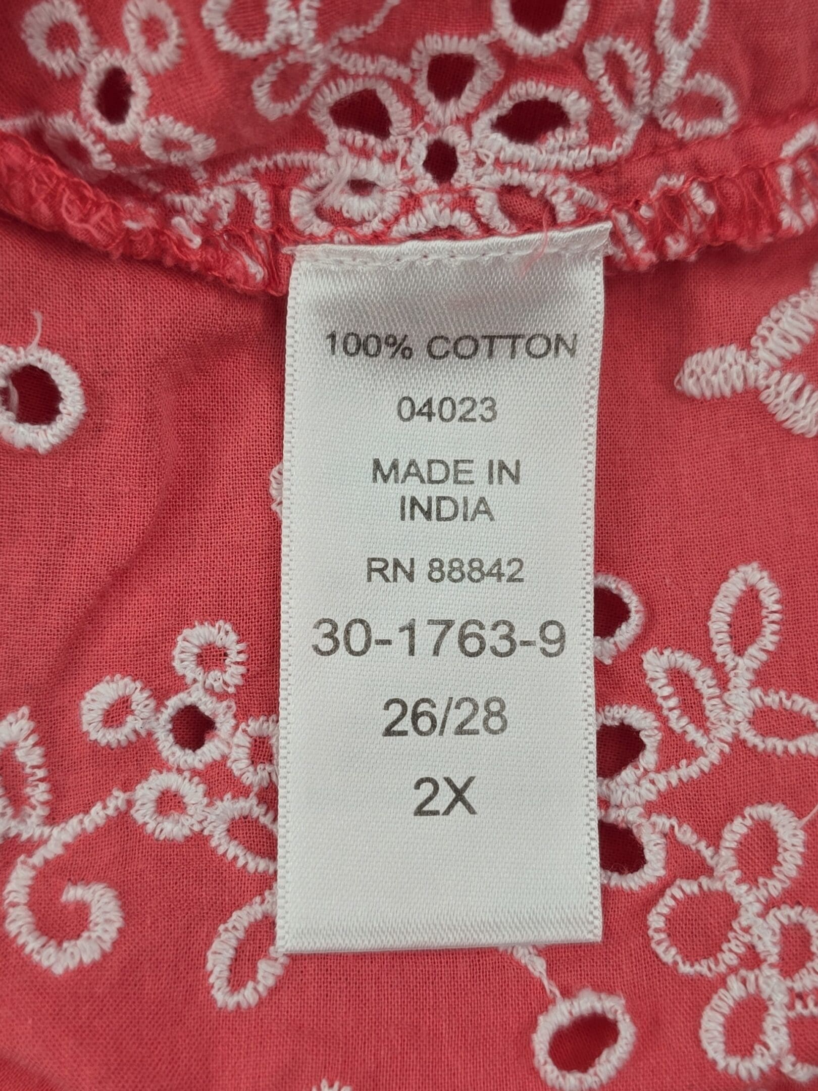 Woman Within blouse material content label
