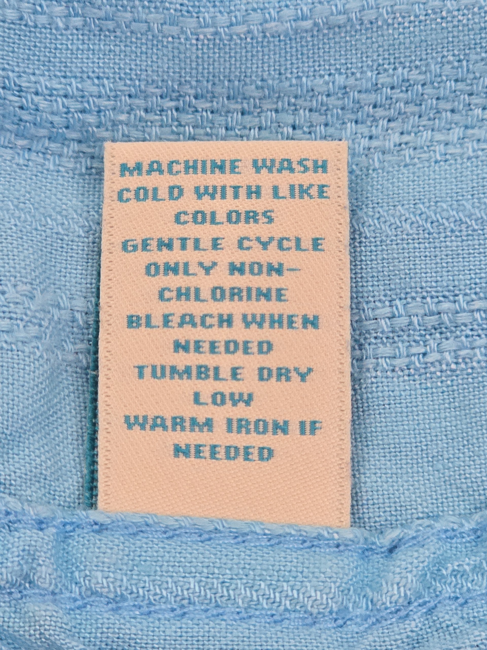 Caribbean shirt care instructions label