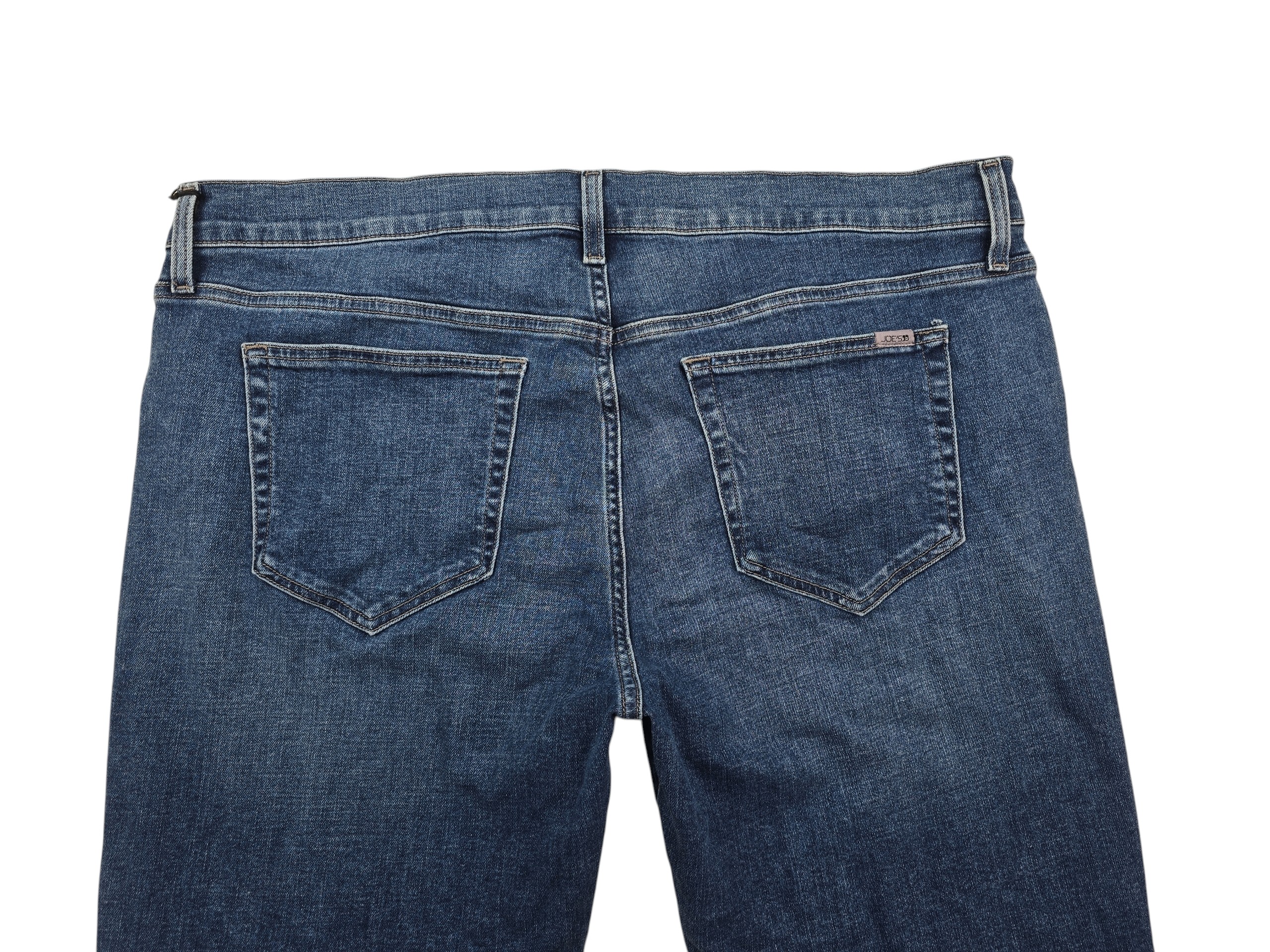 Joe’s Jeans men’s denim jeans up close back view blue wash