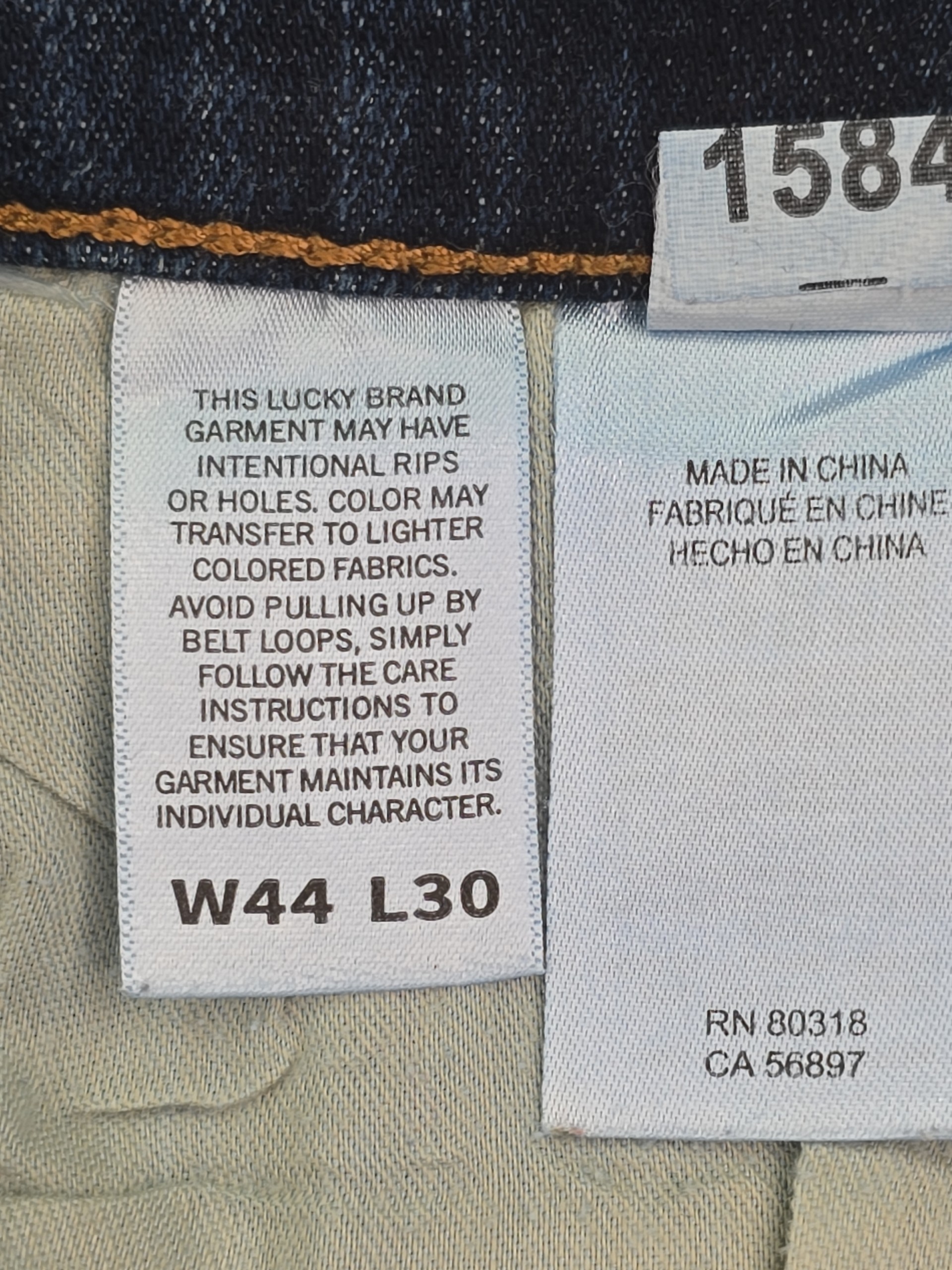 Lucky Brand jeans size tag W44 L30 inside waistband