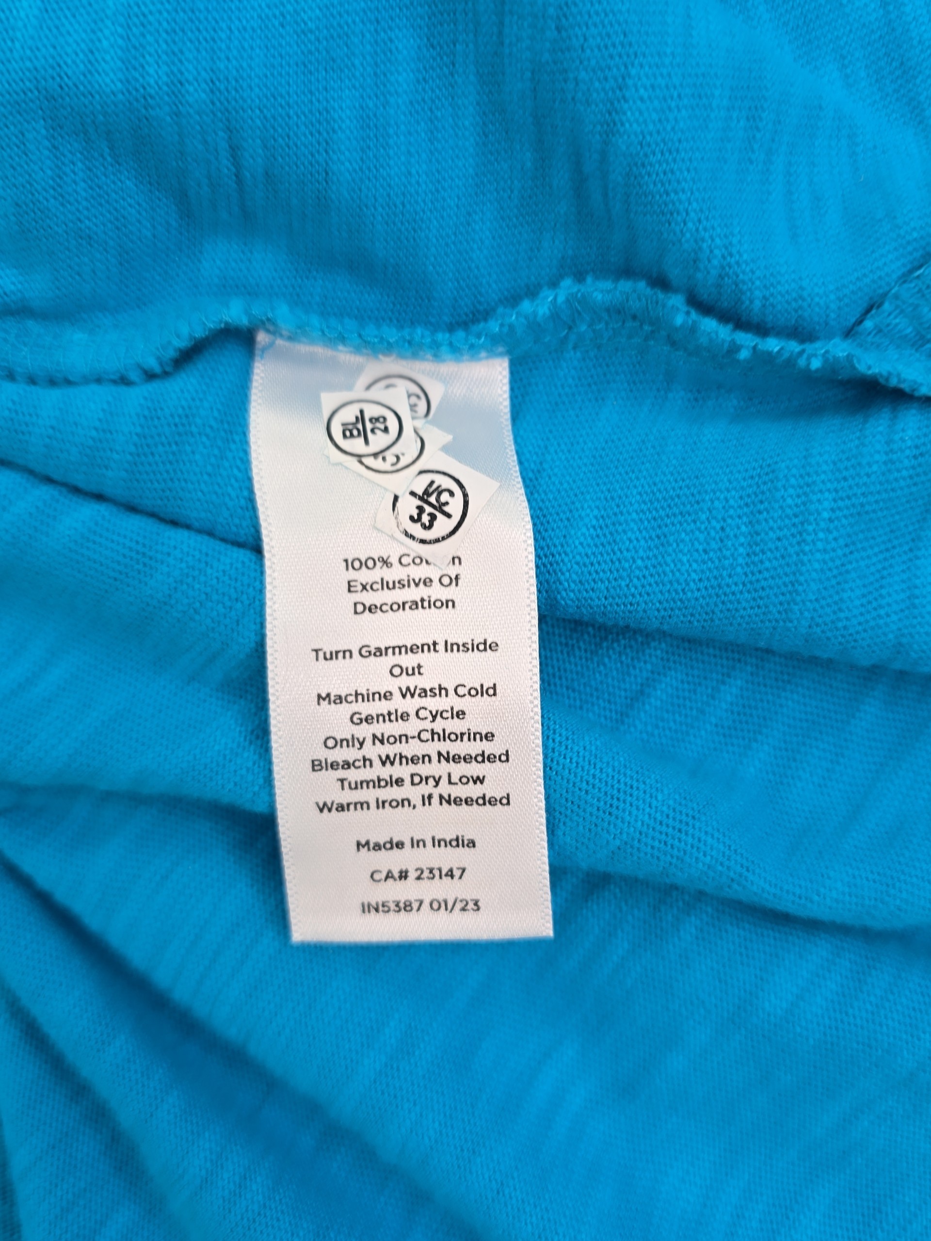Talbots embroidered top care instructions and fabric content tag
